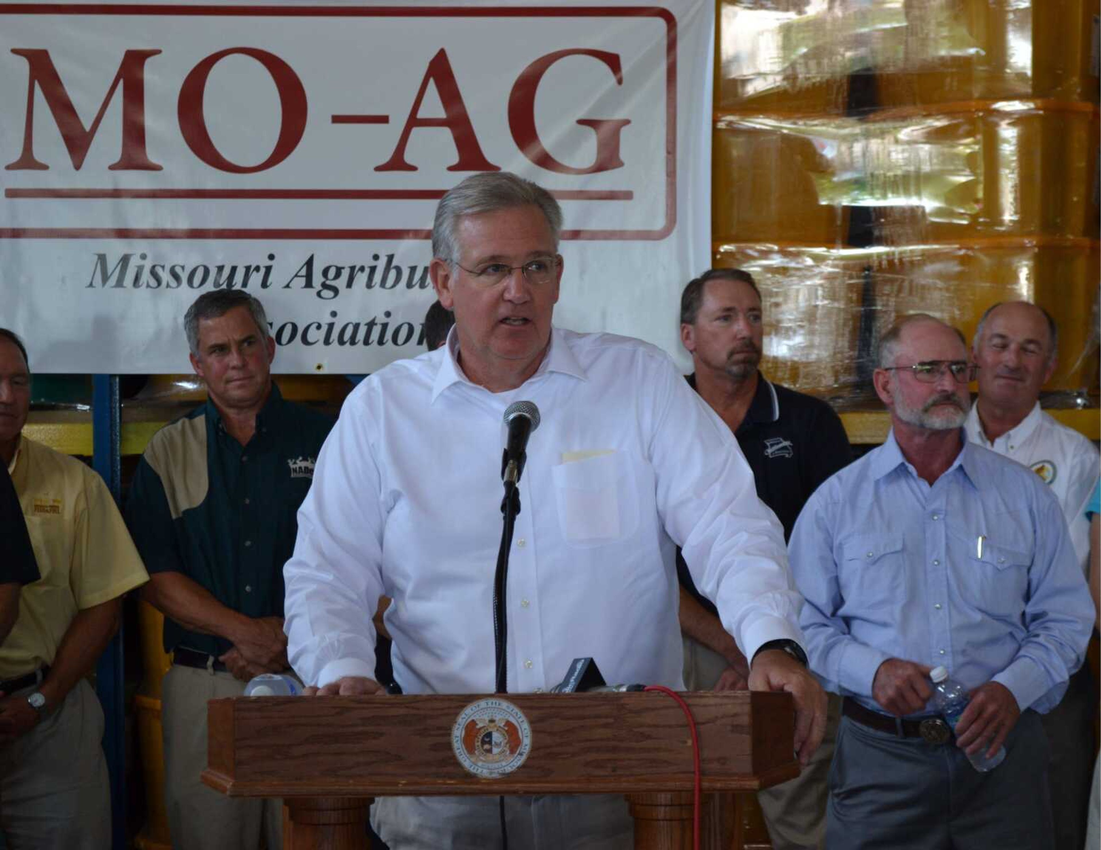 Speaking from a warehouse at the MFA grain storage facility in Mexico, Mo., Gov. Jay Nixon addresses reporters about an omnibus agriculture bill. He signed the bill into law Monday. (Tim Sampson ~ Missouri News Horizon)