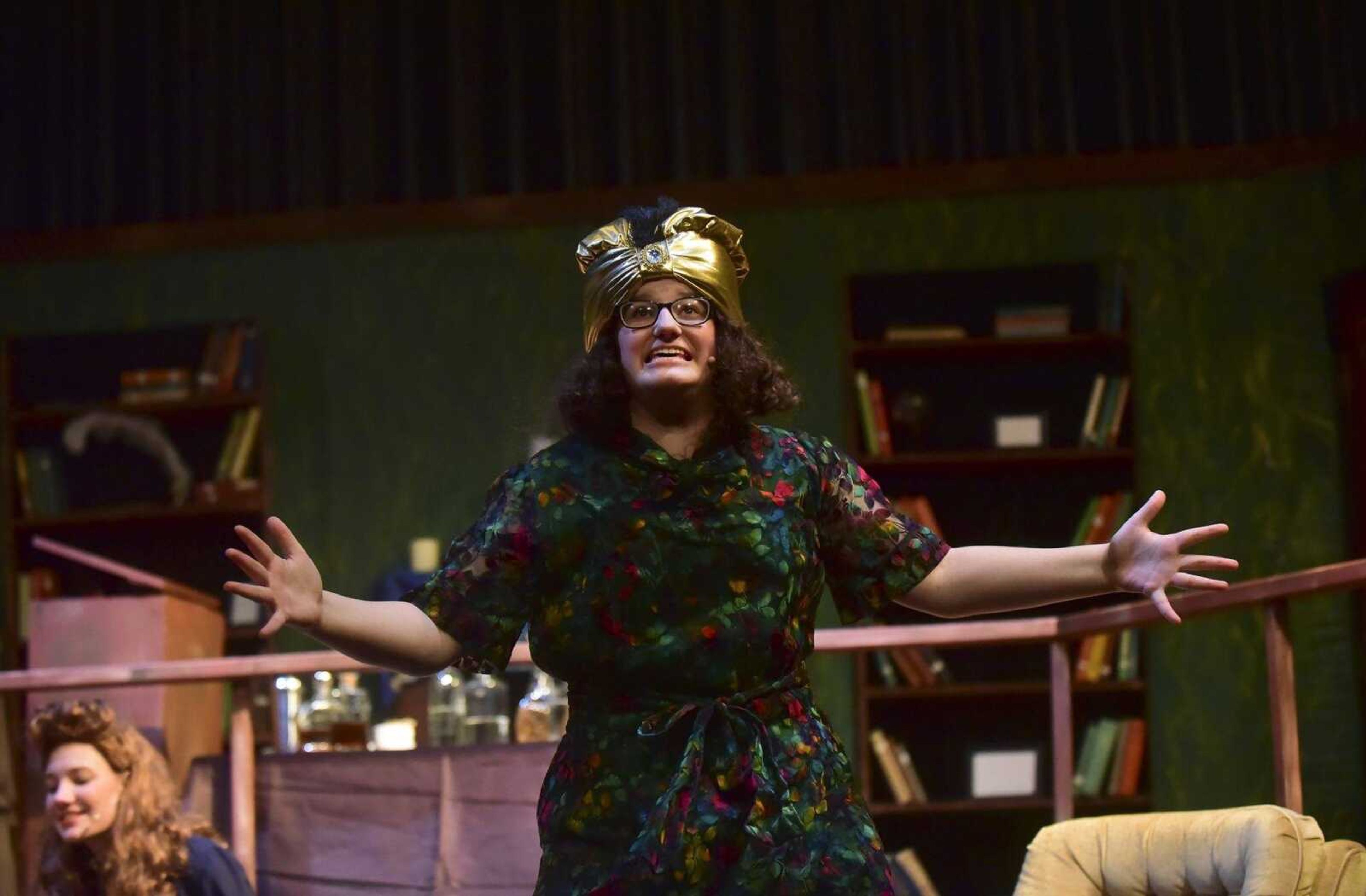 Grace Goeckler as Madame Arcati acts out a scene during a dress rehearsal for the play Blithe Spirit at the Richard D. Kinder Performance Hall at Cape Central High School in Cape Girardeau.