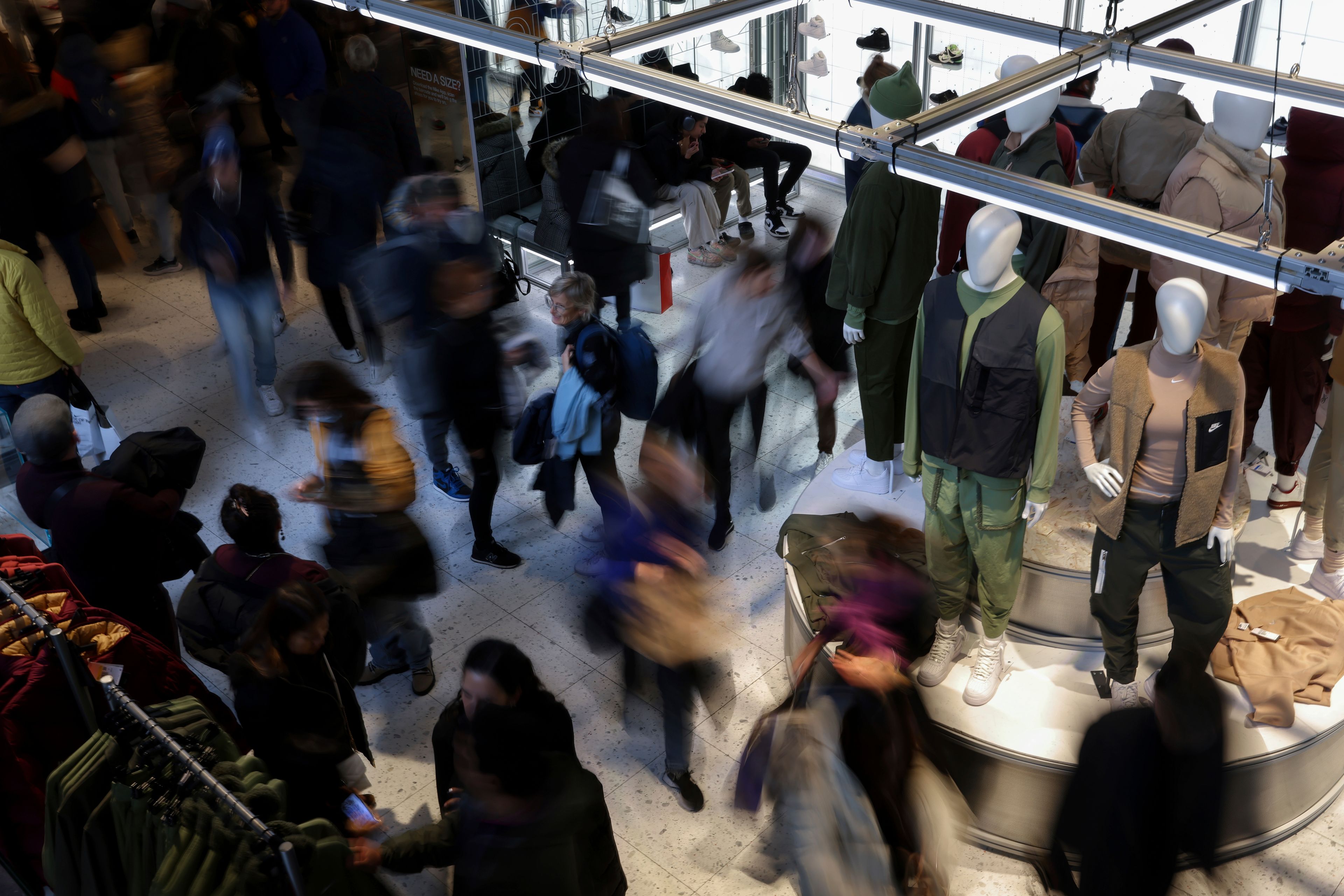 FILE - People shop at a retail store on Black Friday, Nov. 25, 2022, in New York. (AP Photo/Julia Nikhinson, File)