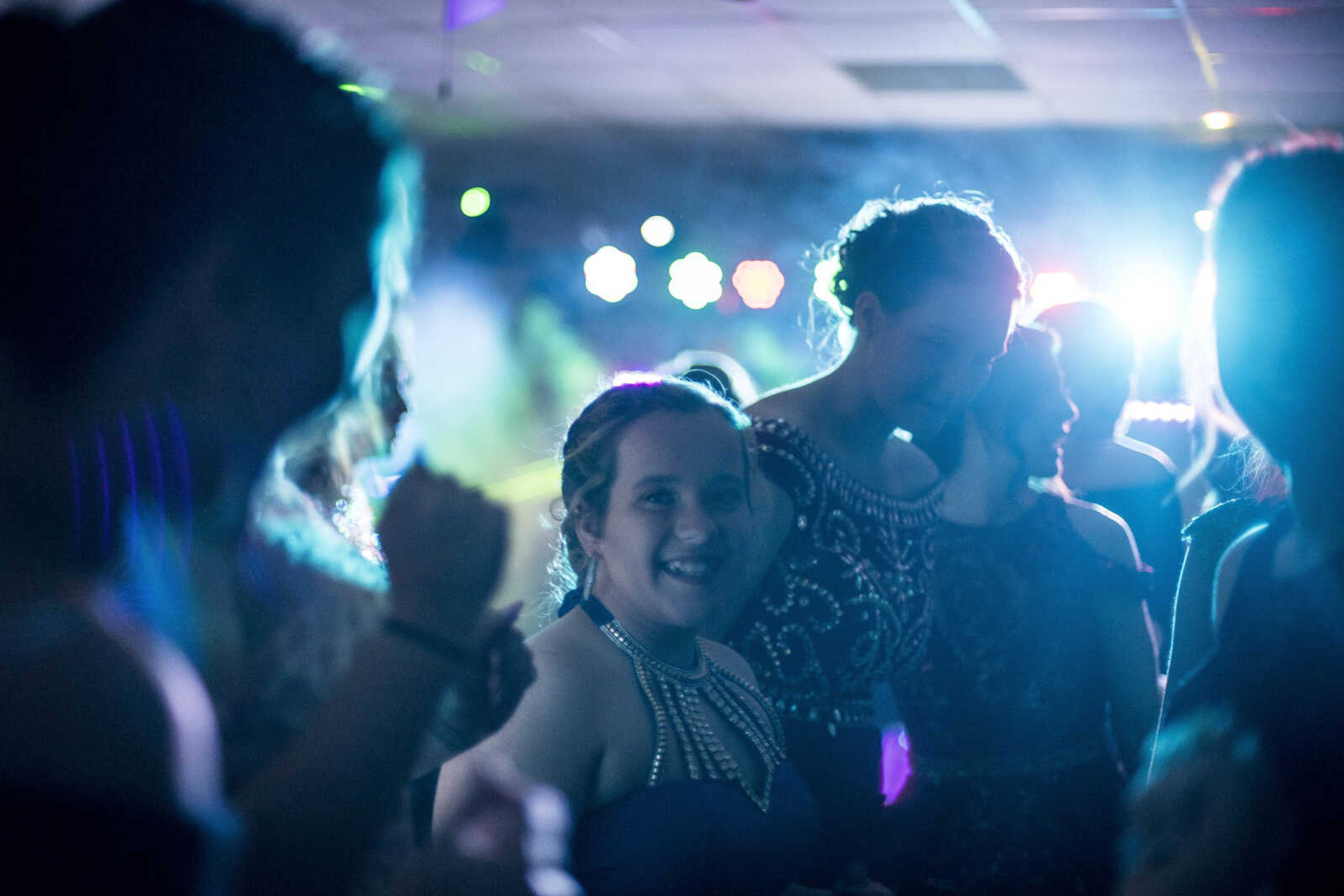 Mae Masterson, center, dances with friends during the Oak Ridge Prom Saturday, April 13, 2019, at the Jackson Elks Lodge in Jackson.