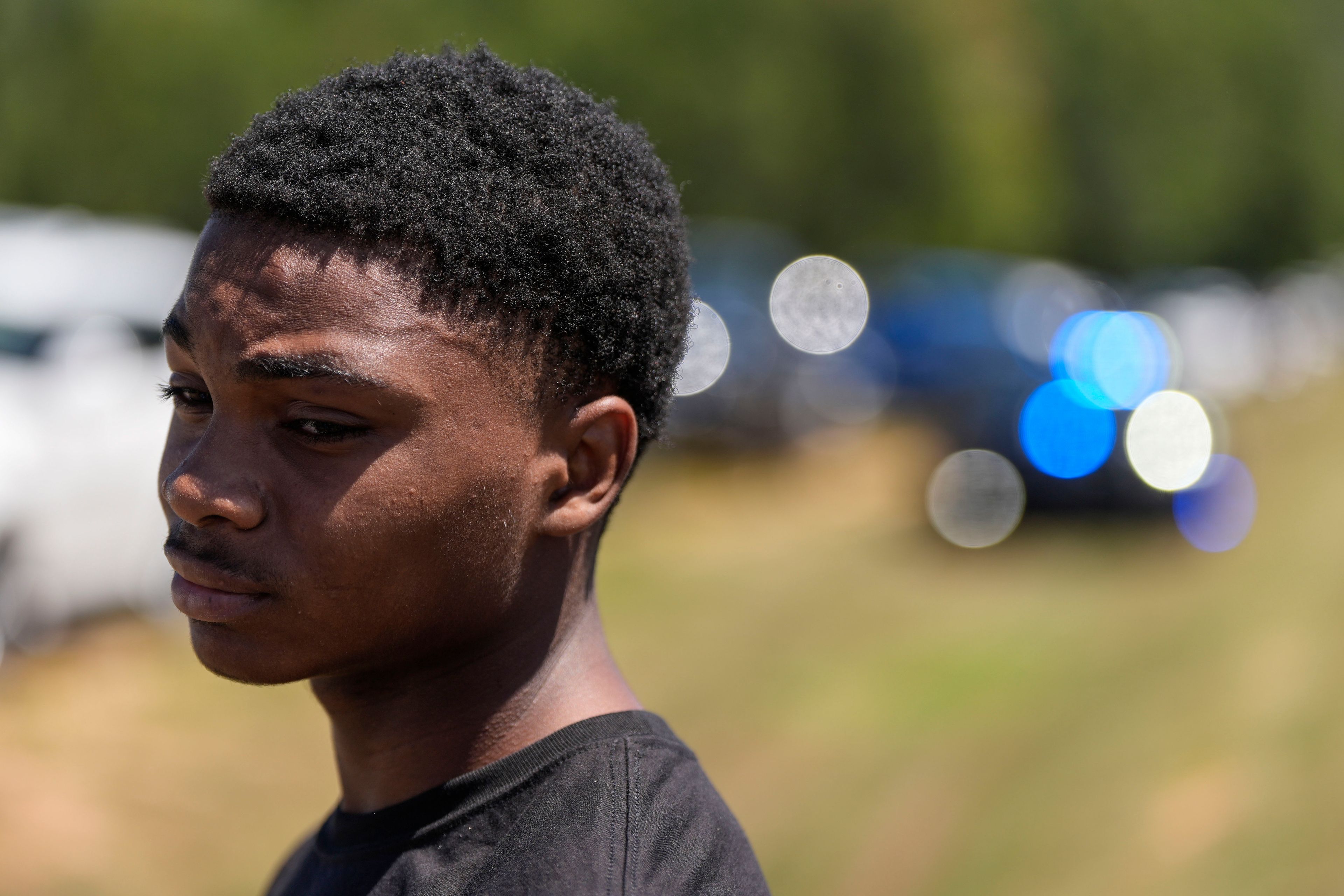 Ninth grader Jacob Fokuo describes the shooting at Apalachee High School, Wednesday, Sept. 4, 2024, in Winder, Ga. A shooting at the Georgia high school Wednesday caused an unknown number of injuries and a suspect was arrested in a chaotic scene. (AP Photo/Mike Stewart)