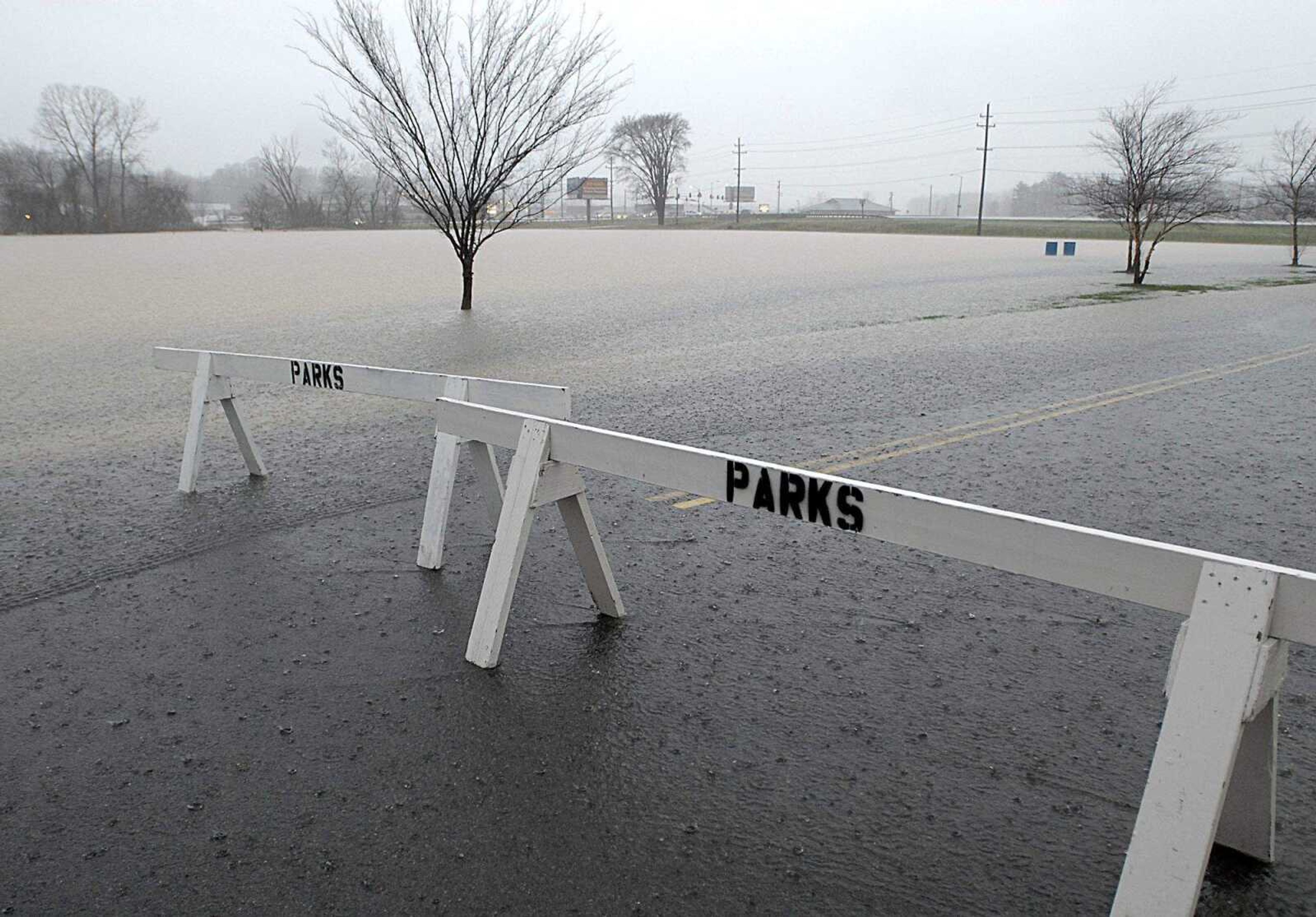 AARON EISENHAUER ~ aeisenhauer@semissourian.com
LaCroix Creek overflowed its banks, reaching the edge of the Osage Center parking lot on Tuesday, March 18, 2008.