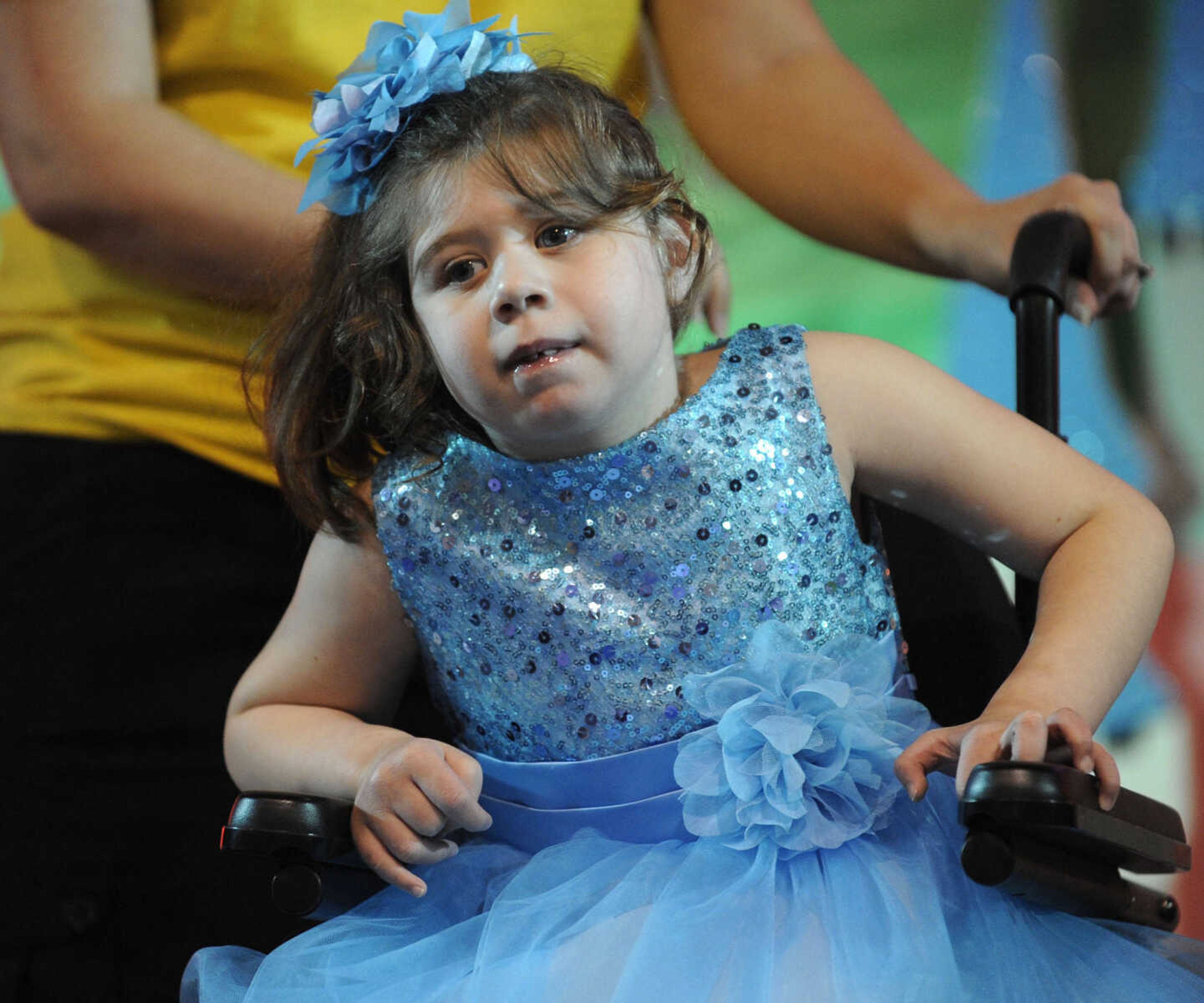 Madison Spaulding poses for the judges in the 5-9 age division of the S. E. Missouri Angels Pageant on Saturday, April 26, 2014 at Scott City High School.