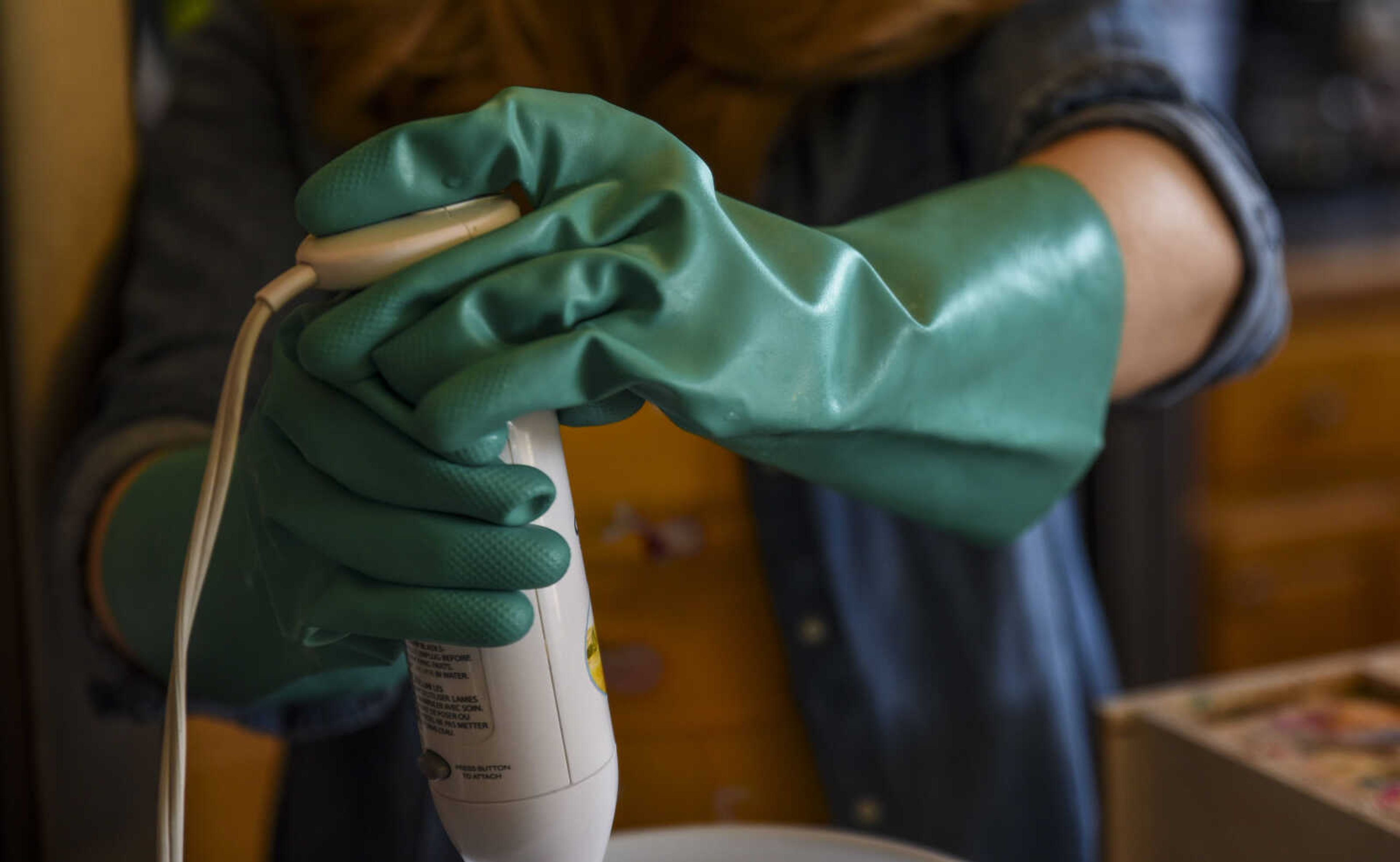 Breanna Stone uses a drink mixer to mix her soap as part of her soap-making process in her home Tuesday, May 1, 2018, in Jackson.