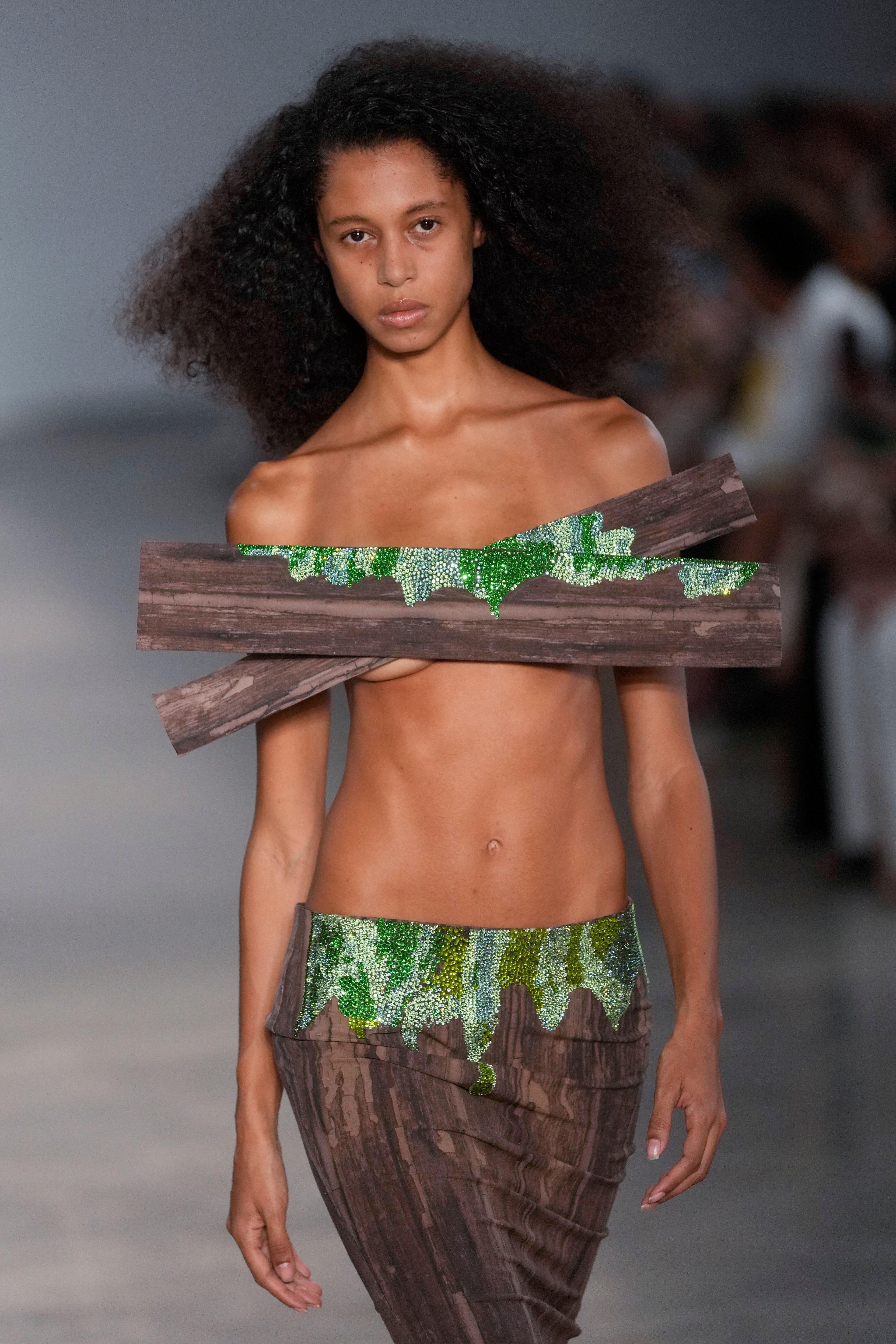 A model wears a creation from the Normando collection during Sao Paulo Fashion Week in Sao Paulo, Wednesday, Oct. 16, 2024. (AP Photo/Andre Penner)