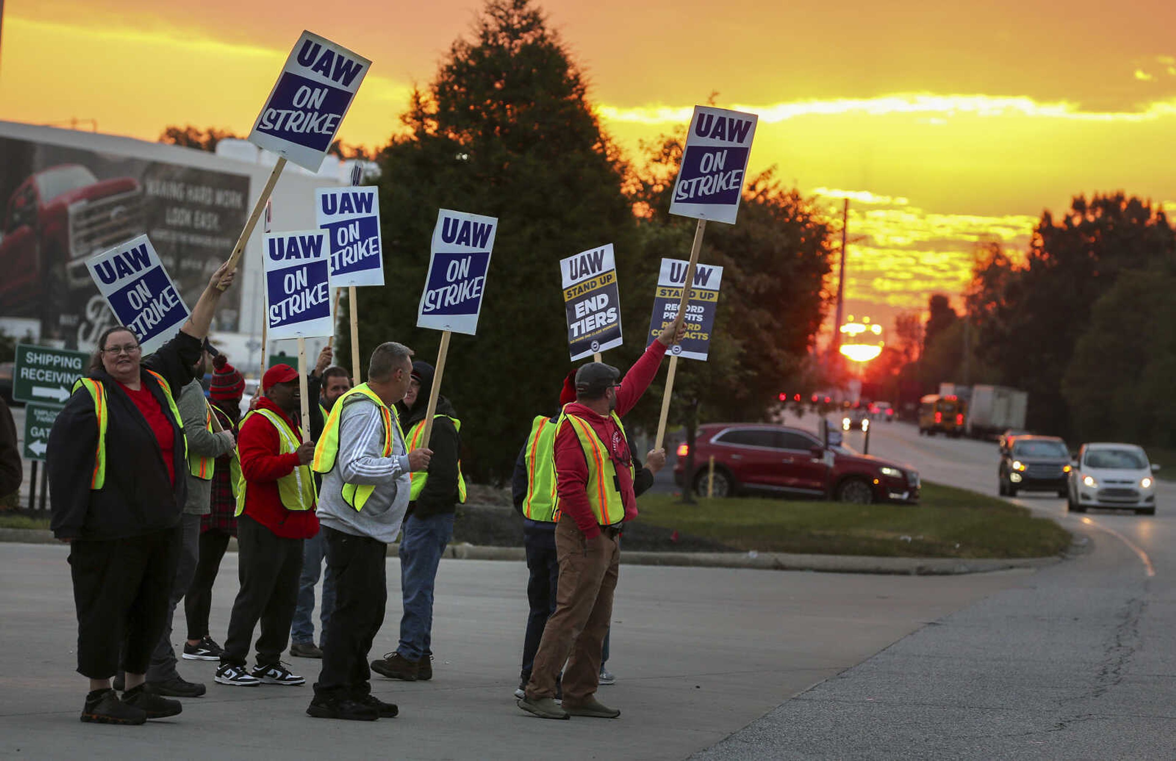 UAW local 862 members strike Oct. 12 outside of Ford's Kentucky Truck Plant in Louisville, Kentucky. In each new contract between the United Auto Workers union and General Motors, Ford and Stellantis, parts of the companies' secret long-term plans for new vehicles are exposed.