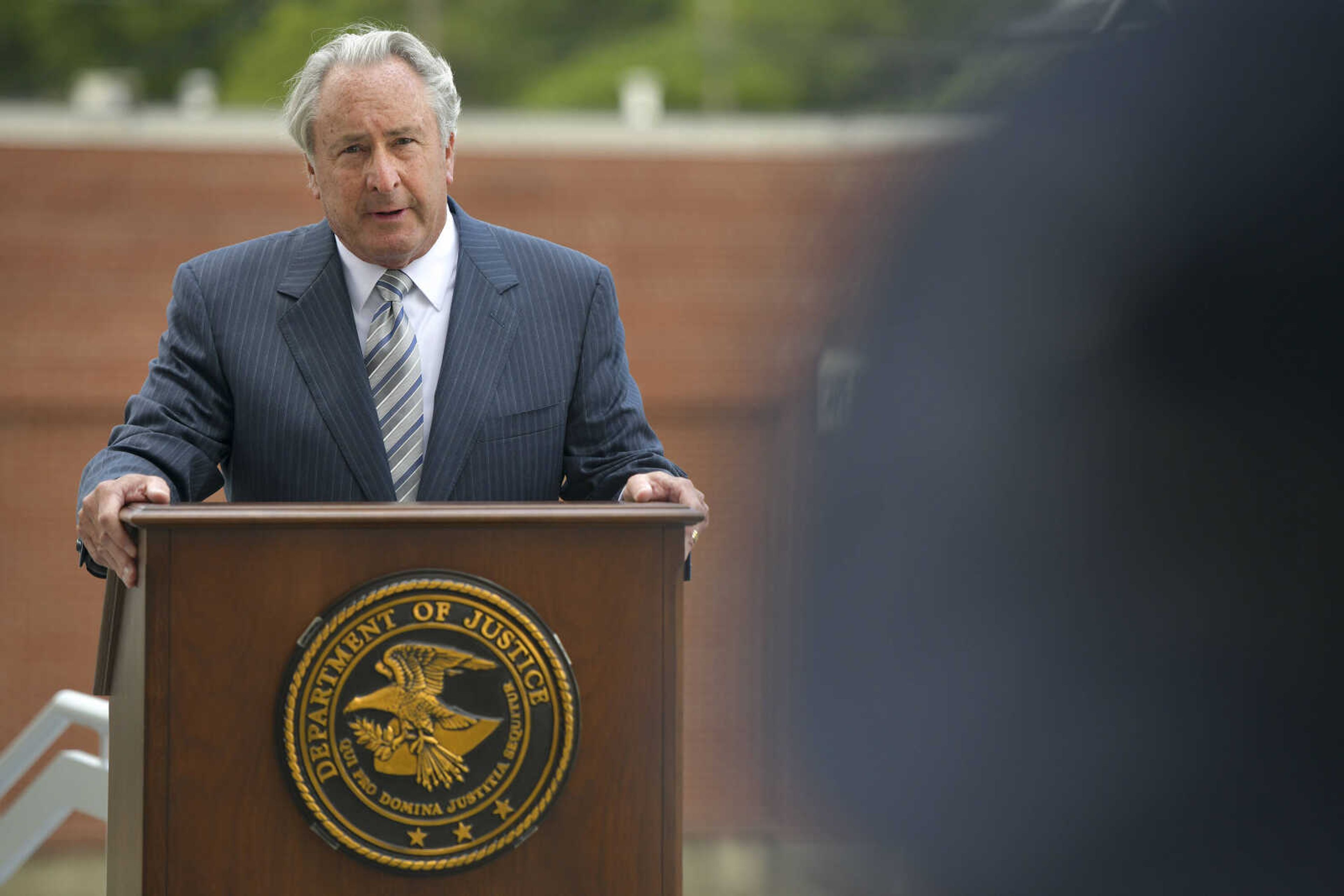 U.S. District Judge Stephen N. Limbaugh Jr. speaks to the crowd during a ceremony Thursday, July 9, 2020, at the Rush Hudson Limbaugh Sr. Federal Courthouse in Cape Girardeau to honor the seven officers involved in the July 2018 arrest of James O'Dell Johnson in Poplar Bluff. The federal judge praised the officers for their "exemplary training and competence" in enduring the "harrowing" encounter without anyone being killed or seriously injured.