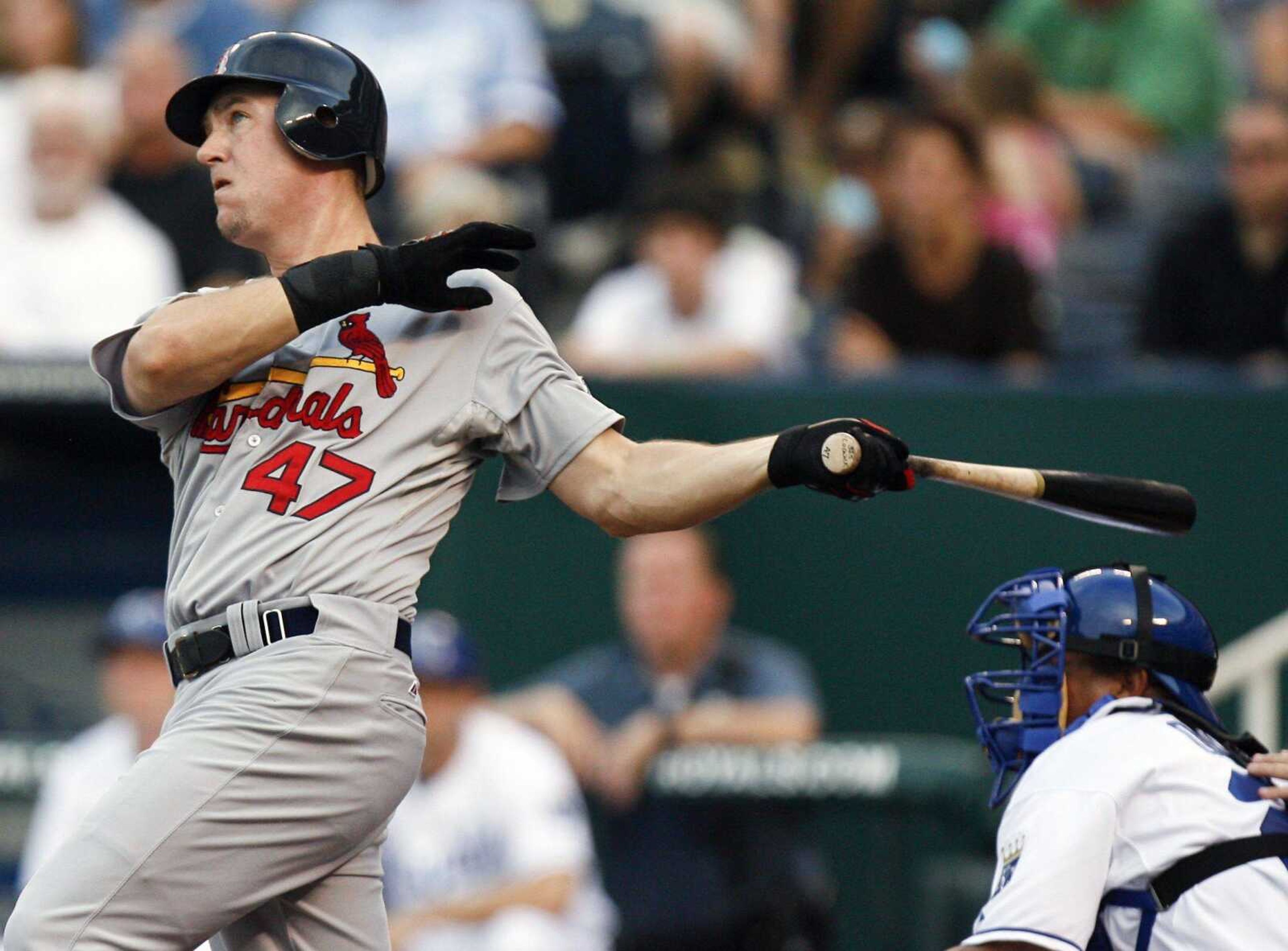 The Cardinals' Ryan Ludwick watches his grand slam home run during the third inning Thursday against the Royals in Kansas City, Mo. (ED ZURGA ~ Associated Press)