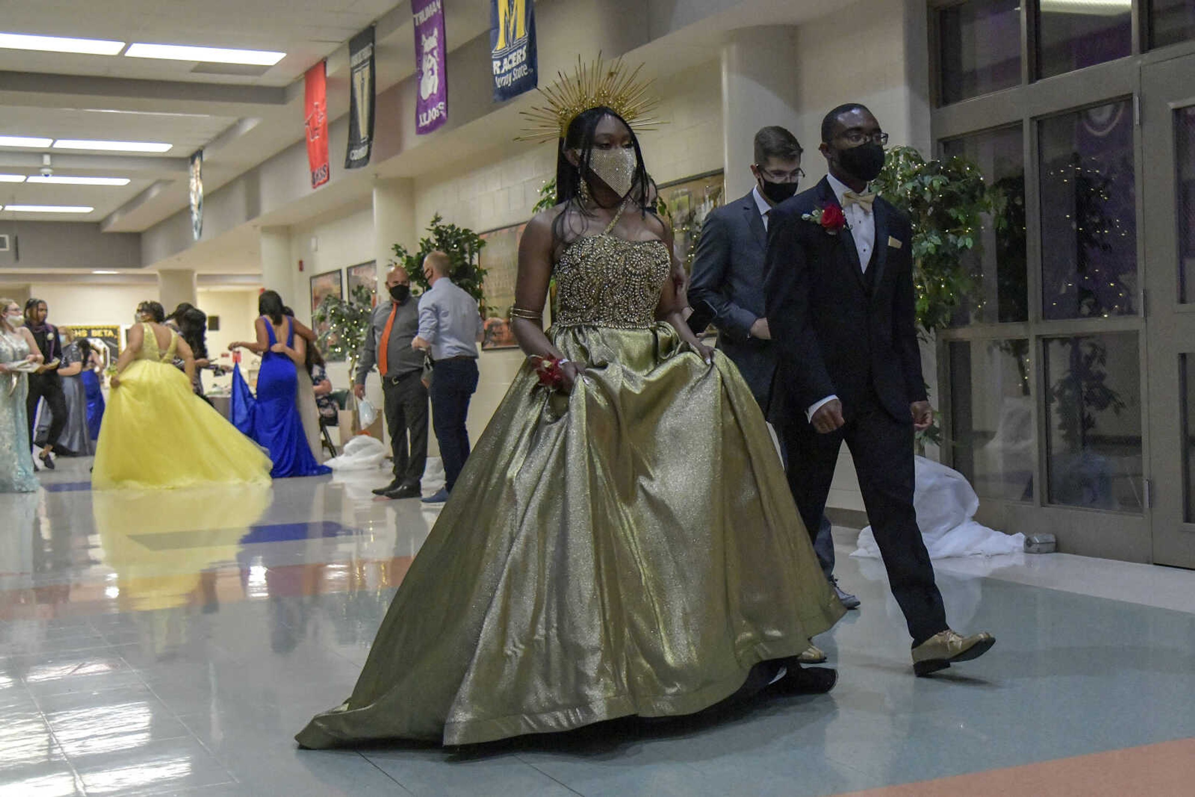 Rokerra Lewis enters the prom at Cape Central High School in Cape Girardeau on Saturday, May 8, 2021.