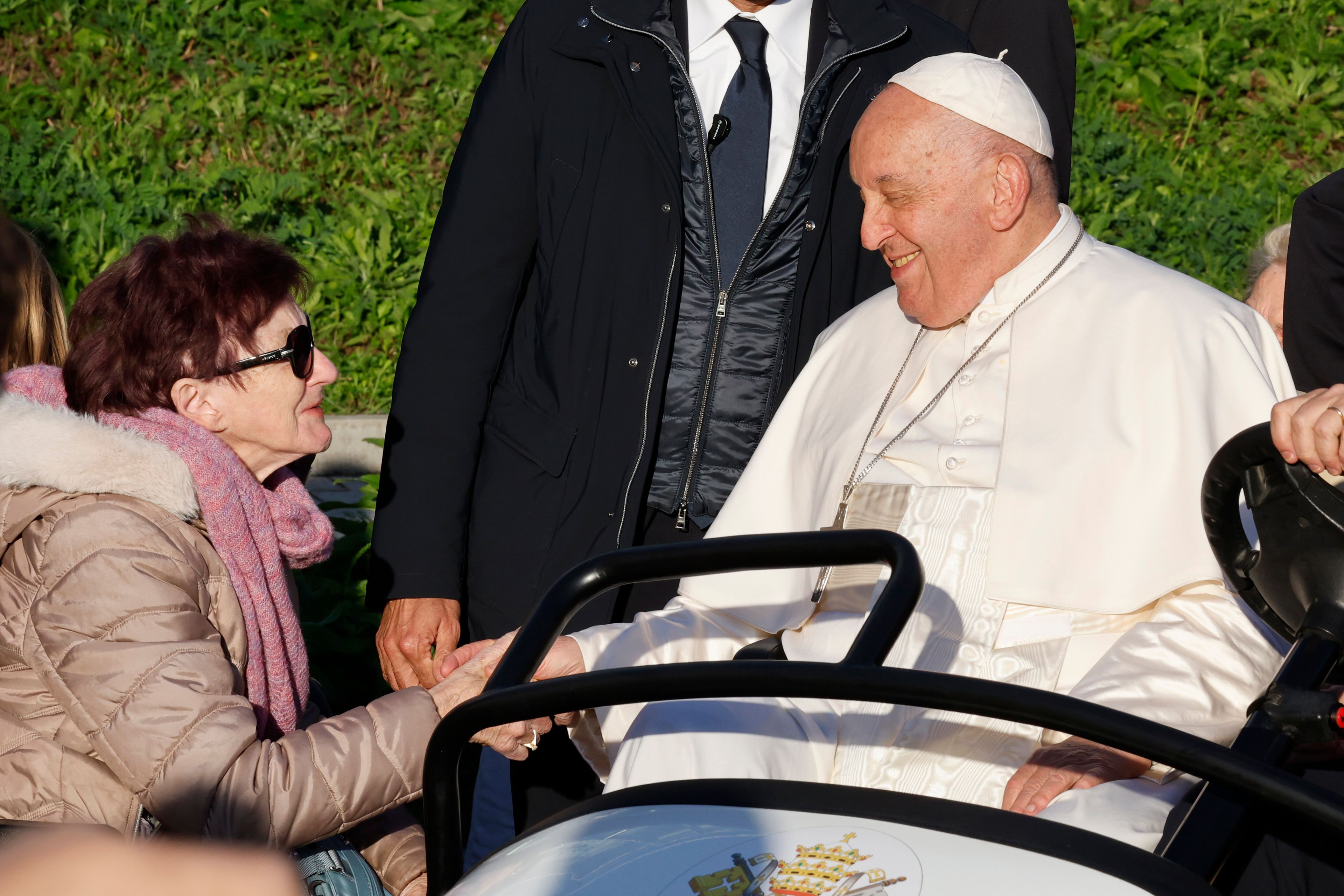 Pope Francis cheers faithful at the end of his meeting with students of the Louvain Catholic University in Ottignies-Louvain-la-Neuve, Belgium, Saturday, Sept. 28, 2024. (AP Photo/Geert Vanden Wijngaert)