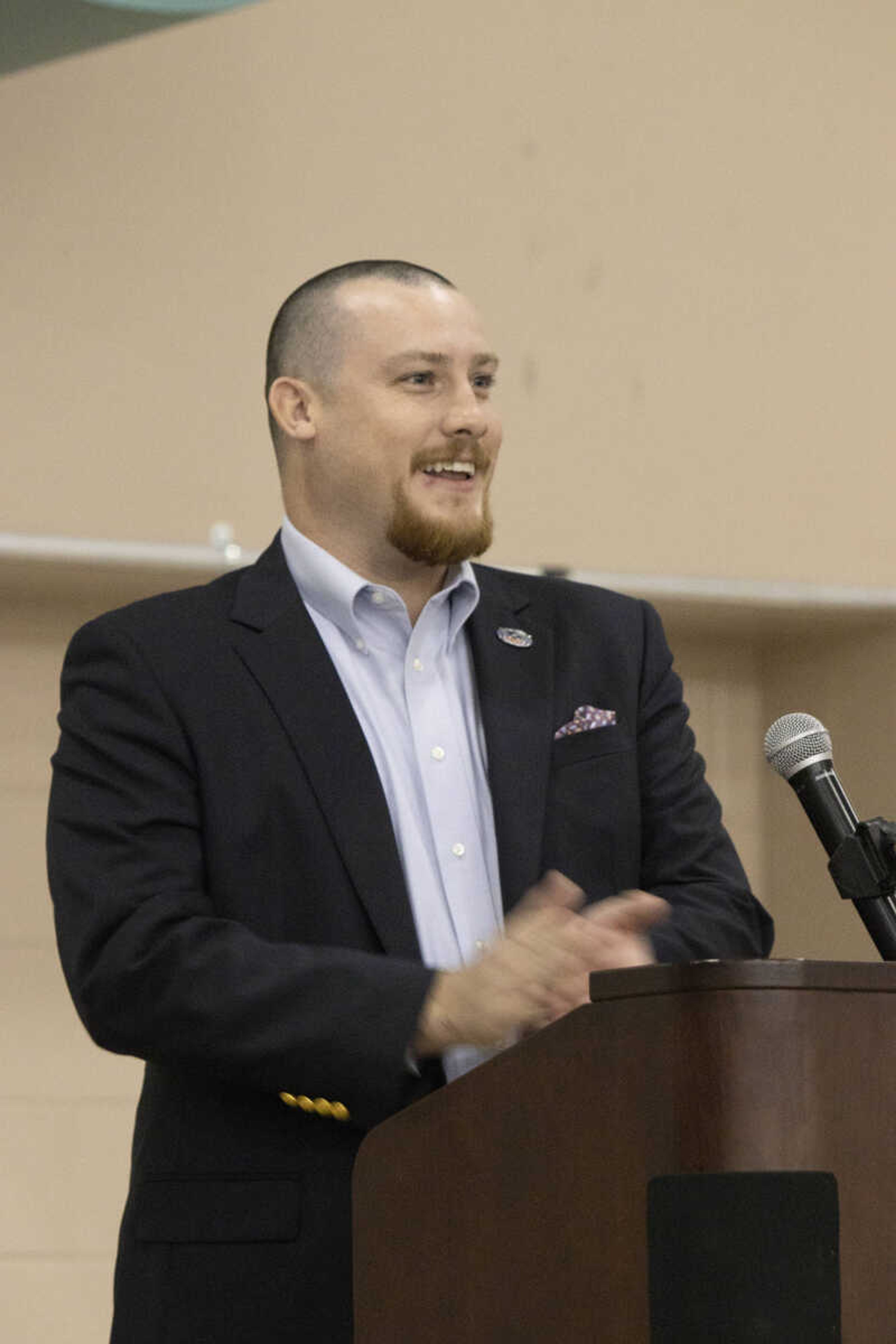 Sawyer Smith introduces himself to the audience and talks about the dinner and silent auction on Saturday.