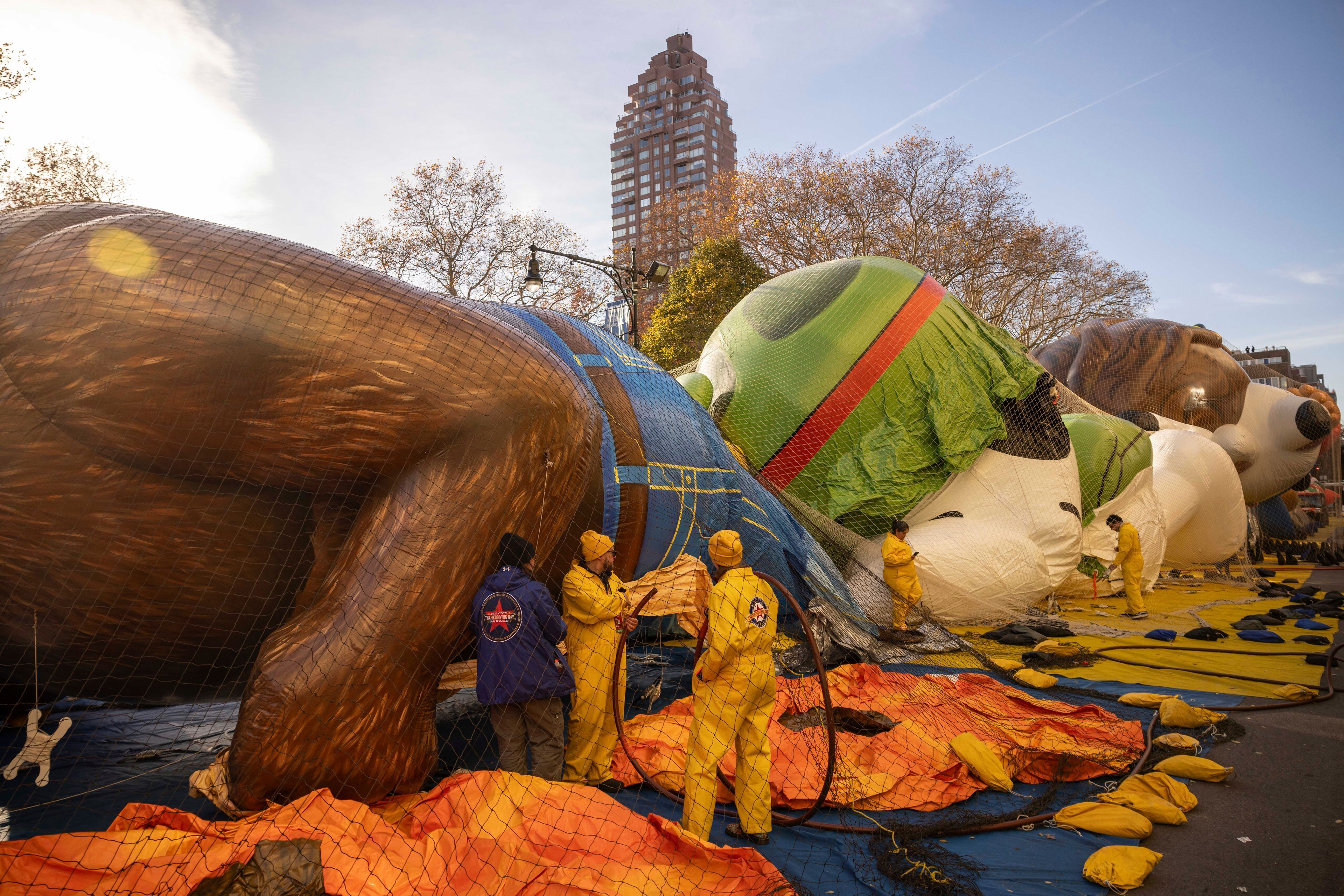 People inflate floats in preparation for the Macy's Thanksgiving Day Parade, Wednesday, Nov. 27, 2024, in New York. (AP Photo/Yuki Iwamura)