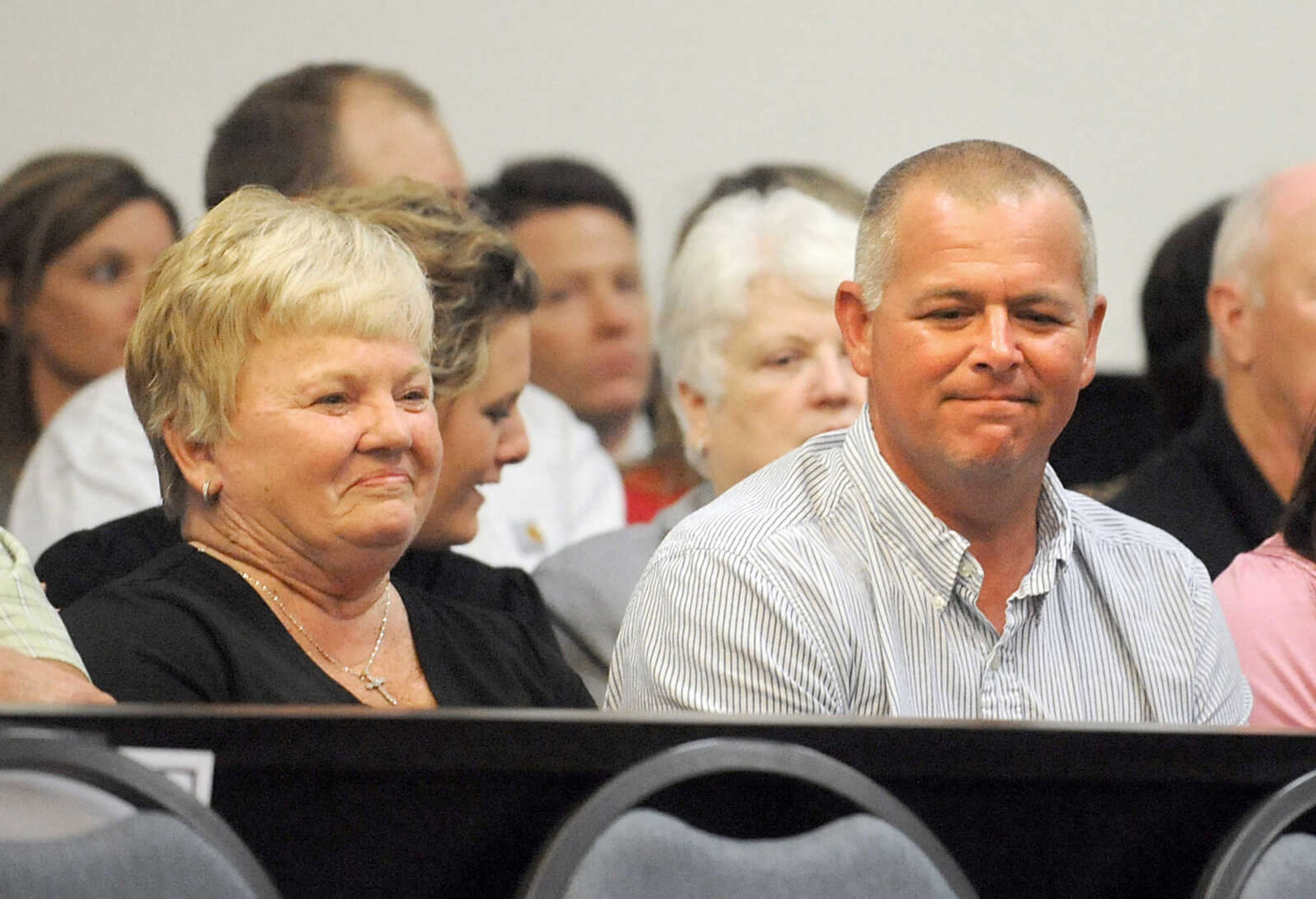 LAURA SIMON ~ lsimon@semissourian.com 
Jacque Waller's family wait inside the courtroom, Thursday, June 6, 2013, at the Cape Girardeau County Courthouse. Clay Waller pleaded guilty to second-degree murder for the death of his wife, Jacque Waller. Jacque Waller went missing June 1, 2011. Her body was found last Wednesday in Southern Illinois.