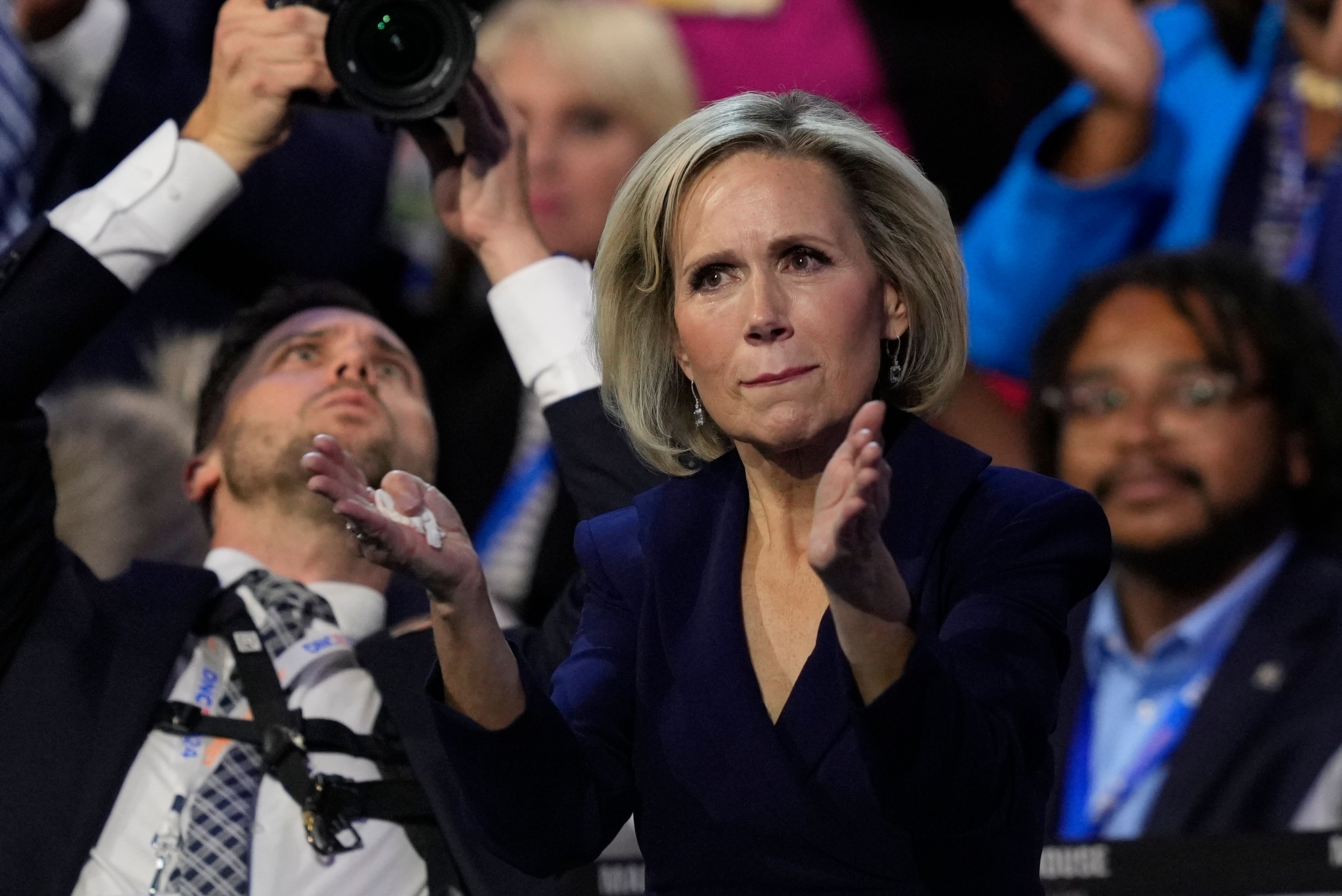 Gwen Walz claps as Democratic vice presidential nominee Minnesota Gov. Tim Walz speaks during the Democratic National Convention Wednesday, Aug. 21, 2024, in Chicago. (AP Photo/Matt Rourke)