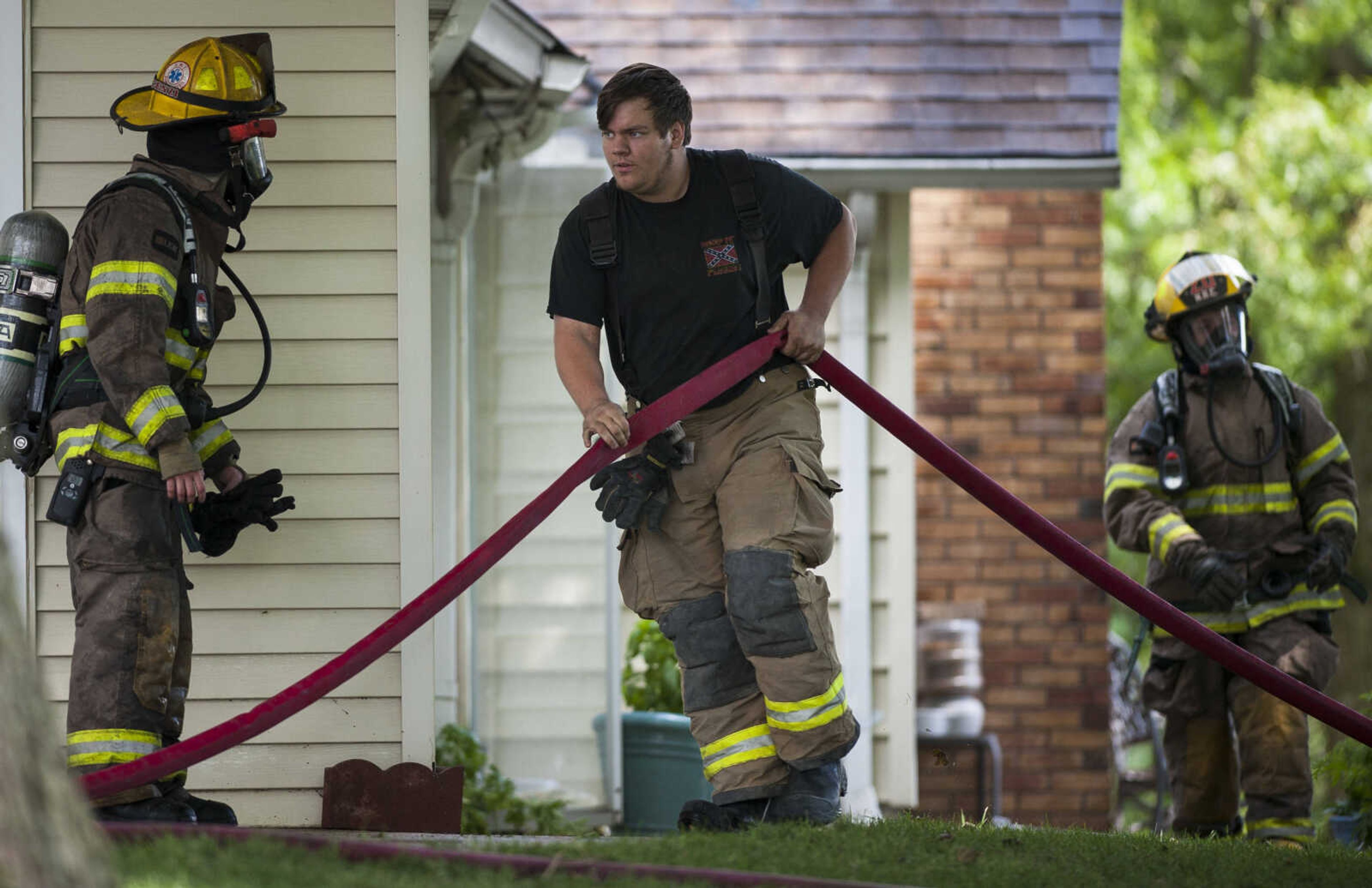 Members of the NBC Fire Protection District receive mutual aid from the Oran Fire Protection District, the Scott City Fire Department, the Scott County Rural Fire Protection District and the Scott County Sheriff's Office during a working fire Thursday, June 25, 2020, in the 300 block of Lake Road in Scott County between U.S. Highway 61 and Interstate 55.