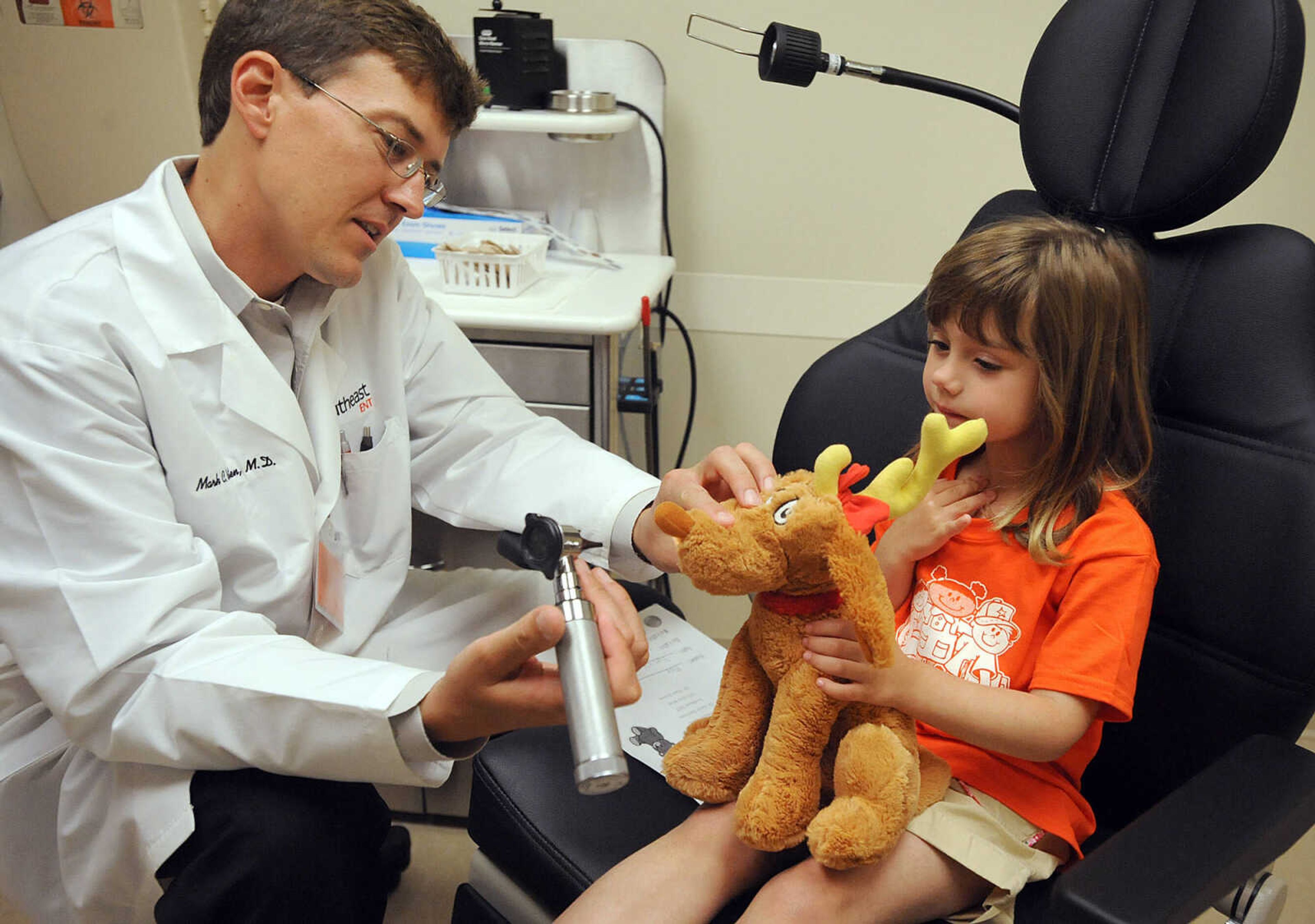 LAURA SIMON ~ lsimon@semissourian.com

Dr. Mark C. Rusten examines Shelby Prokopf's stuffed dog Max Tuesday morning, April 30, 2013 at SoutheastHEALTH Primary Care in Cape Girardeau. Big Stuff preschool students got to bring their stuffed animals, ranging from teddy bears to tigers, in for exams Tuesday.