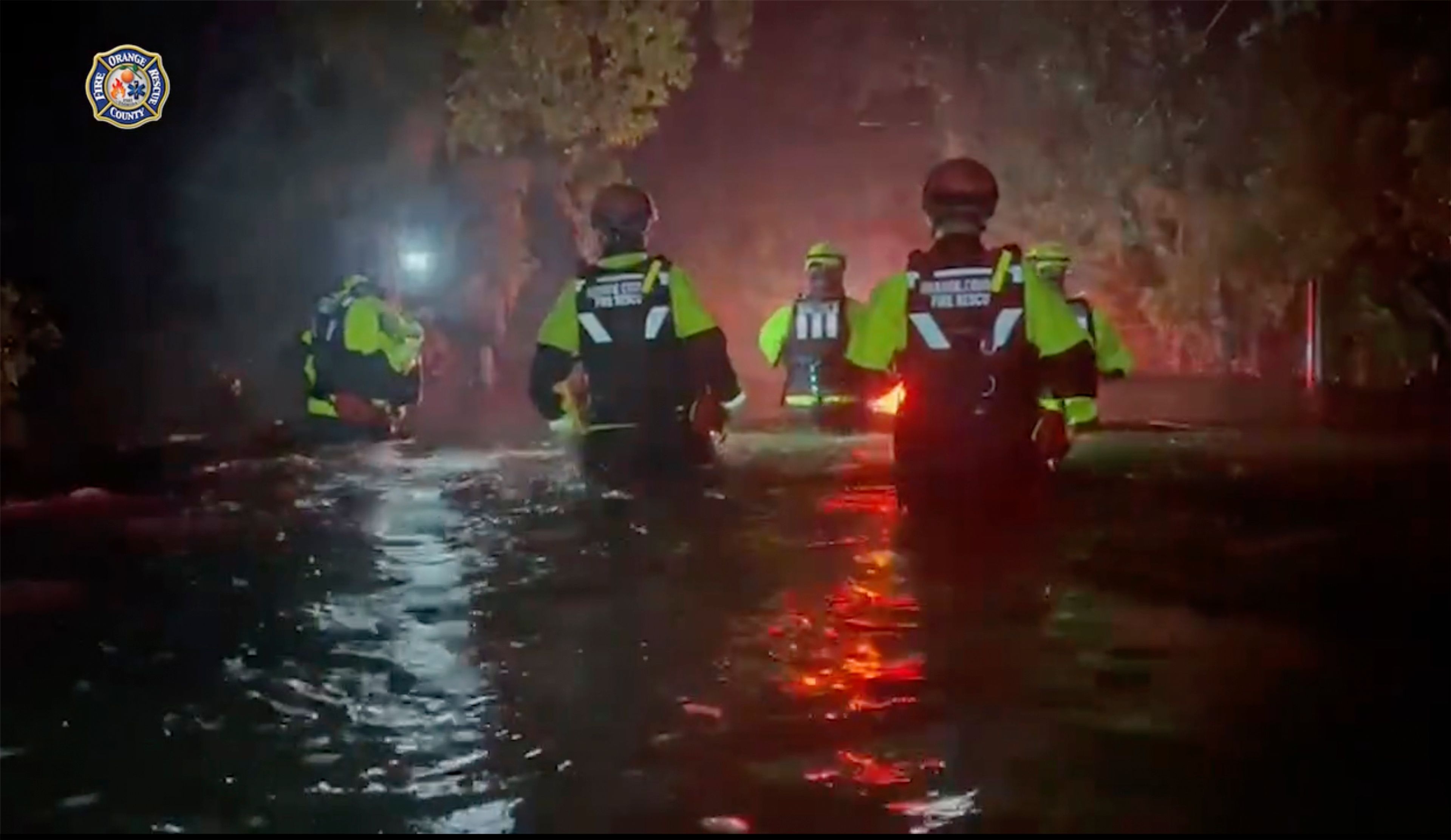 This photo provided by Orange County Fire Rescue Department shows OCFRD along with OCSO working on water rescues after Hurricane Milton early Thursday, Oct. 10, 2024 near Orlando, Fla. (Orange County Fire Rescue Department via AP)