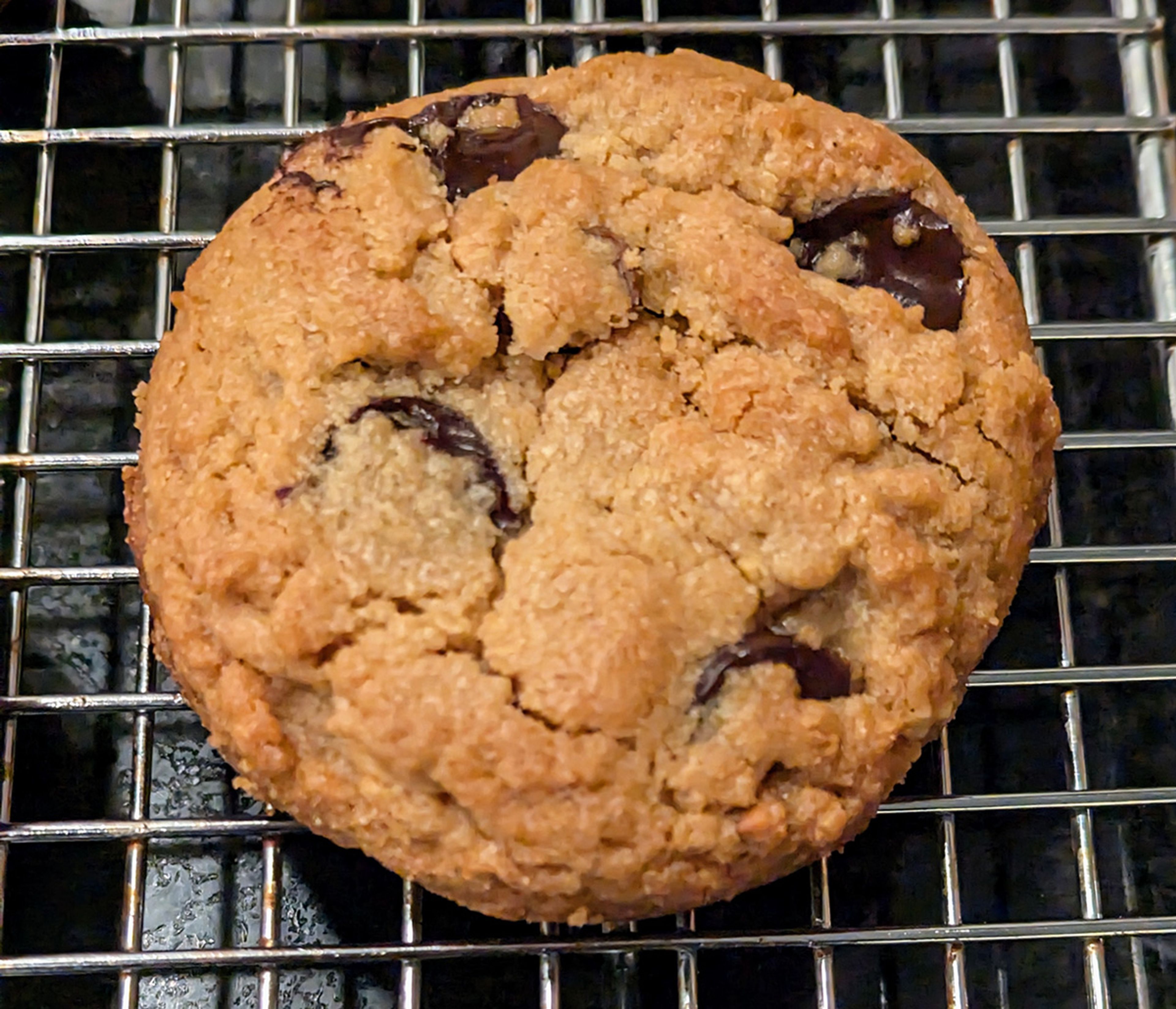 This chocolate and peanut butter cookie benefits from being baked in a muffin pan to make it thicker and fudgier with crispier edges.