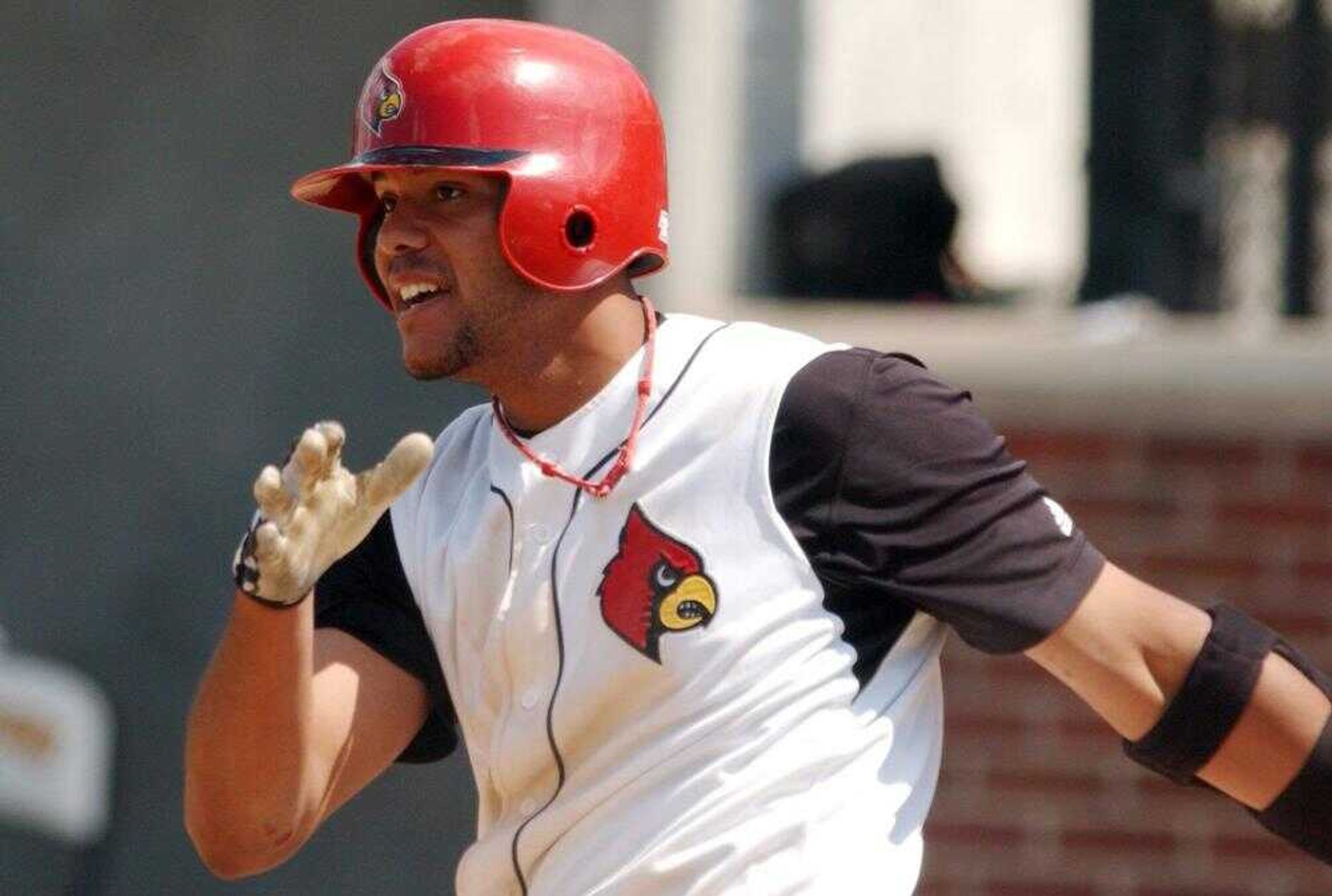 Louisville's Chris Dominguez smacks a hit Monday, June 4, 2007 during Louisville's 16-6 victory over Missouri in an NCAA Regional college baseball championship game in Columbia, Mo. Dominguez was named Most Outstanding Player for the regional hitting four home runs and getting 11 runs batted in. (AP Photo/L.G. Patterson)