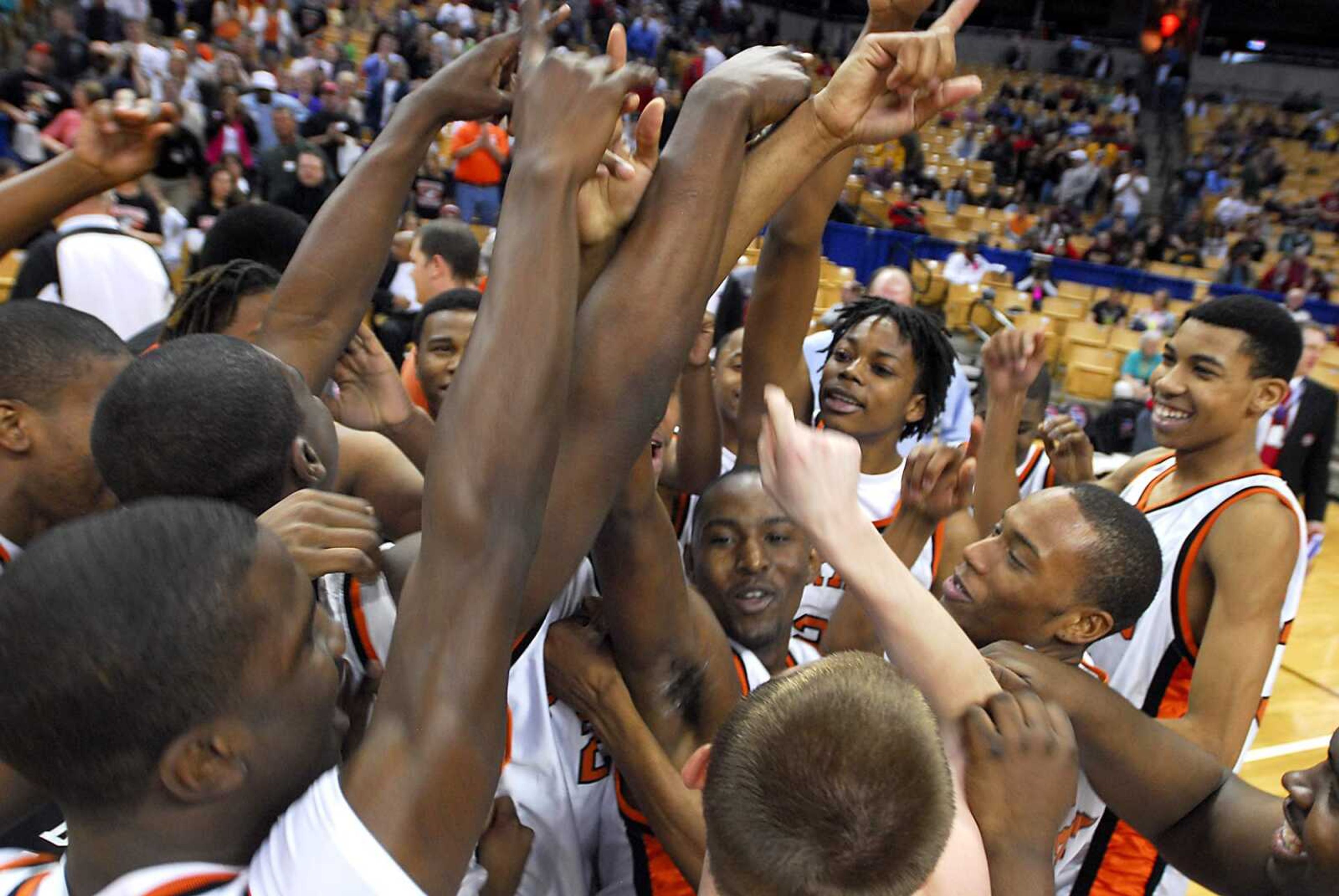 KIT DOYLE ~ kdoyle@semissourian.com
The Scott County Central Braves rush the court celebrating their 98-63 Class 1 state championship victory over Newtown-Harris Saturday, March 21, 2009, at Mizzou Arena in Columbia.