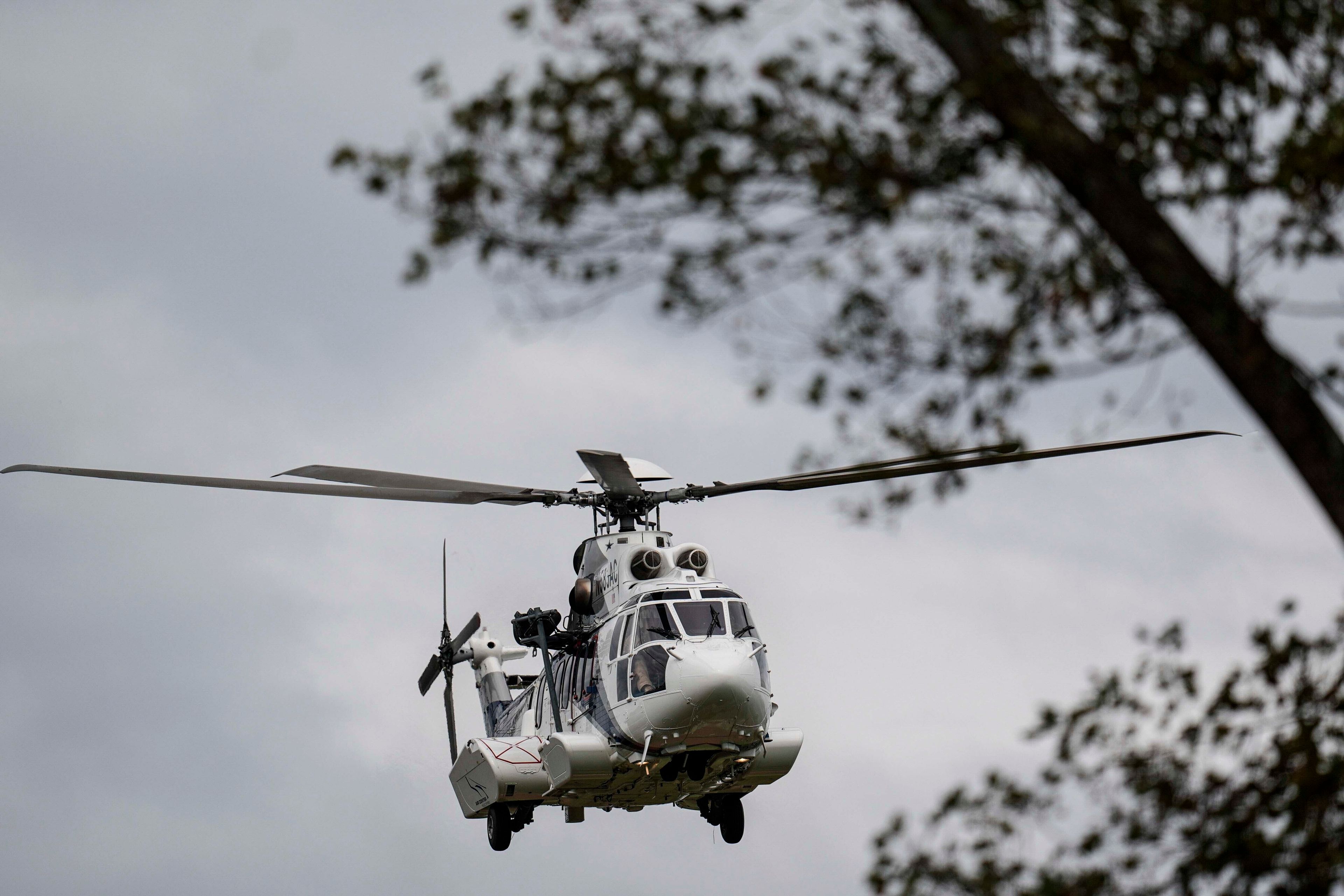 A medical helicopter takes off near downtown in the aftermath of Hurricane Helene, Monday, Sept. 30, 2024, in Asheville, N.C. (AP Photo/Mike Stewart)