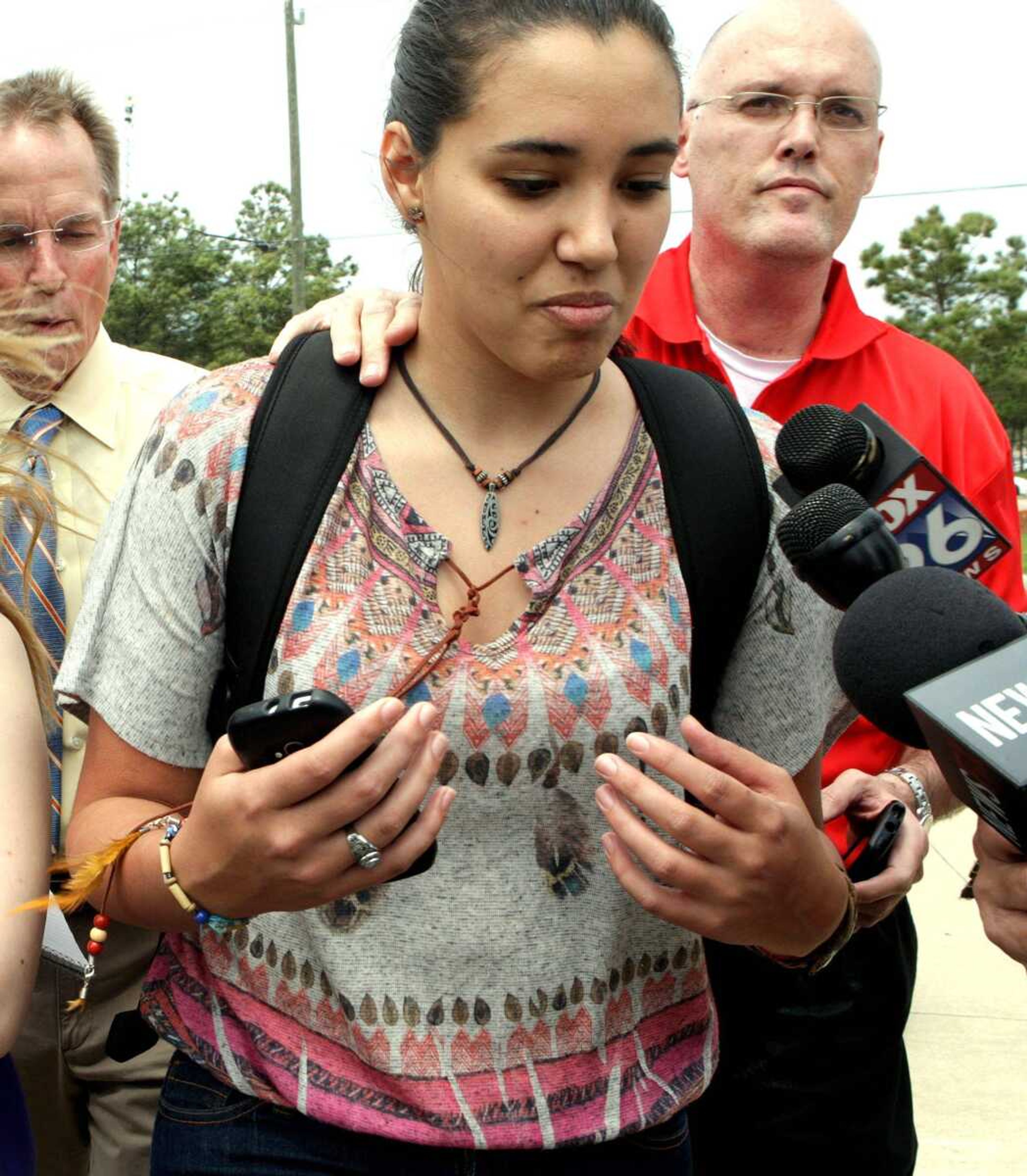 Michelle Alvarez a student at Lone Star College's Cypress-Fairbanks campus was one of the injured in the stabbing attack at the campus, authorities are reporting least 15 people were hurt in a stabbing at the campus Tuesday, April 9, 2013, in Cypress, Texas. (AP Photo/Houston Chronicle, James Nielsen)