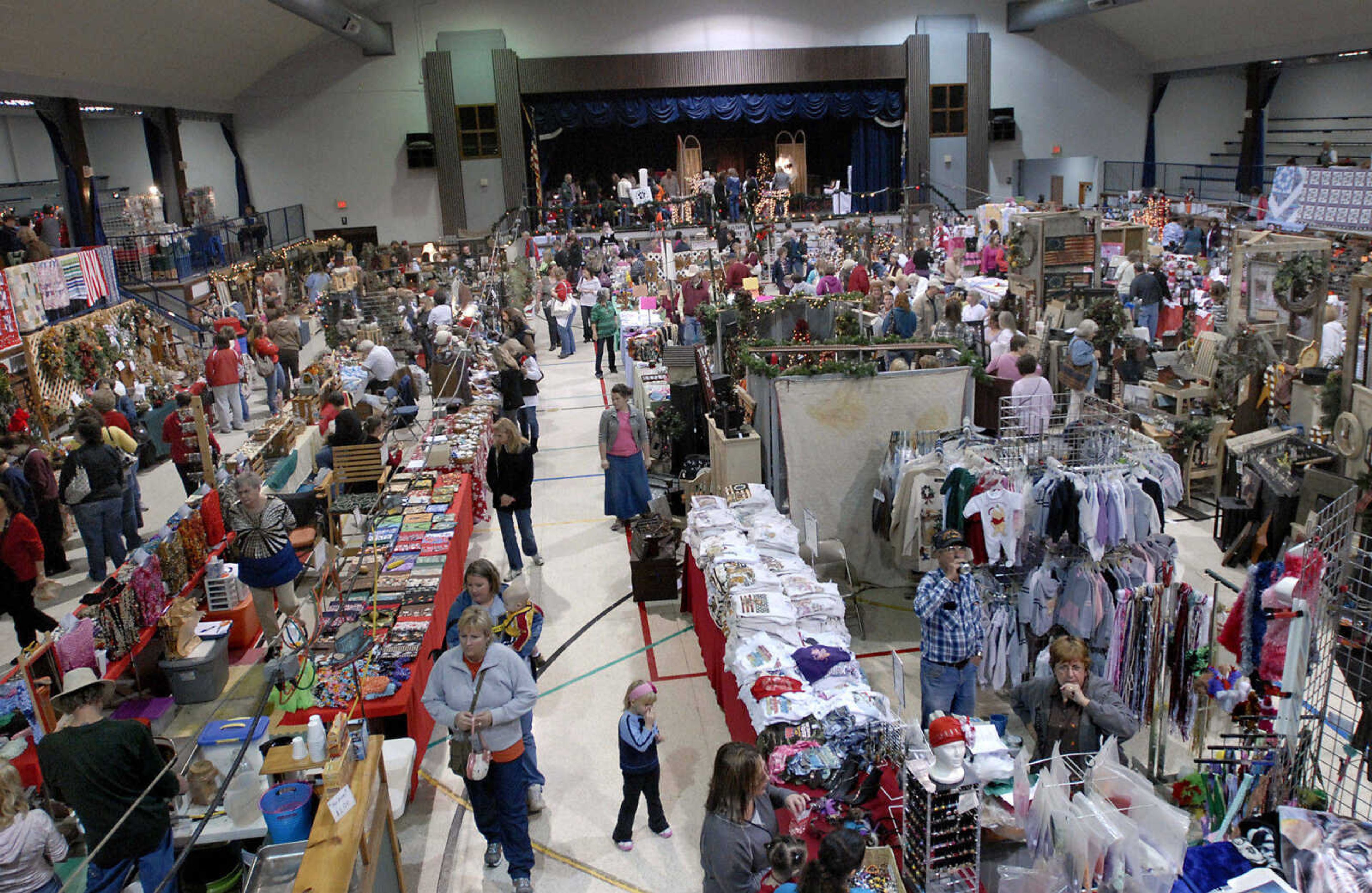 KRISTIN EBERTS ~ keberts@semissourian.com

Shoppers check out the vendors during the River Valley Craft Club Southeast Missouri Craft Fair at the A.C. Brase Arena in Cape Girardeau on Saturday, Nov. 19, 2011.