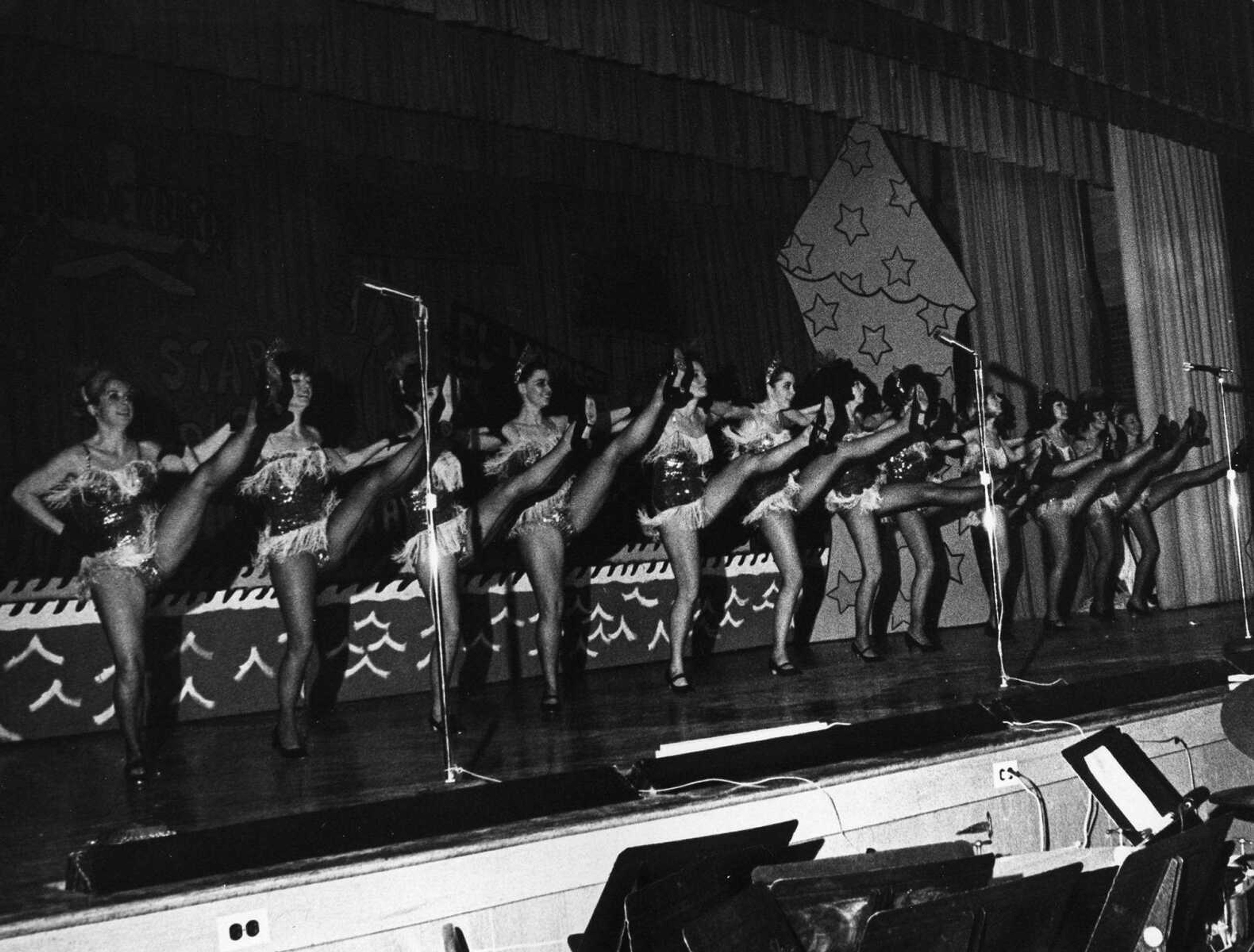 Dancers peform a kick line during a Jaycess Follies show. (Southeast Missourian archive)