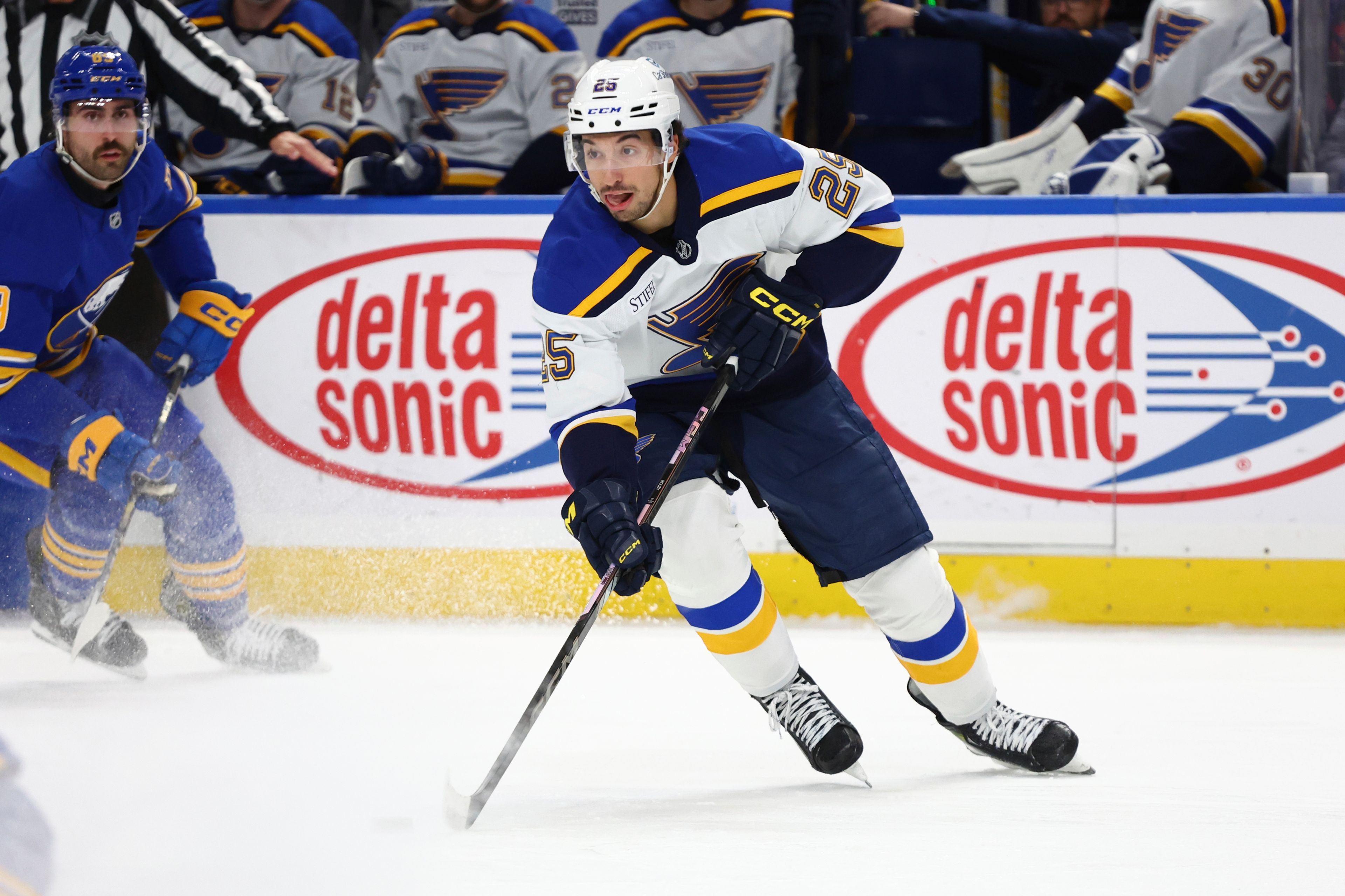 St. Louis Blues center Jordan Kyrou (25) carries the puck during the second period of an NHL hockey game against the Buffalo Sabres, Thursday, Nov. 14, 2024, in Buffalo, N.Y. (AP Photo/Jeffrey T. Barnes)