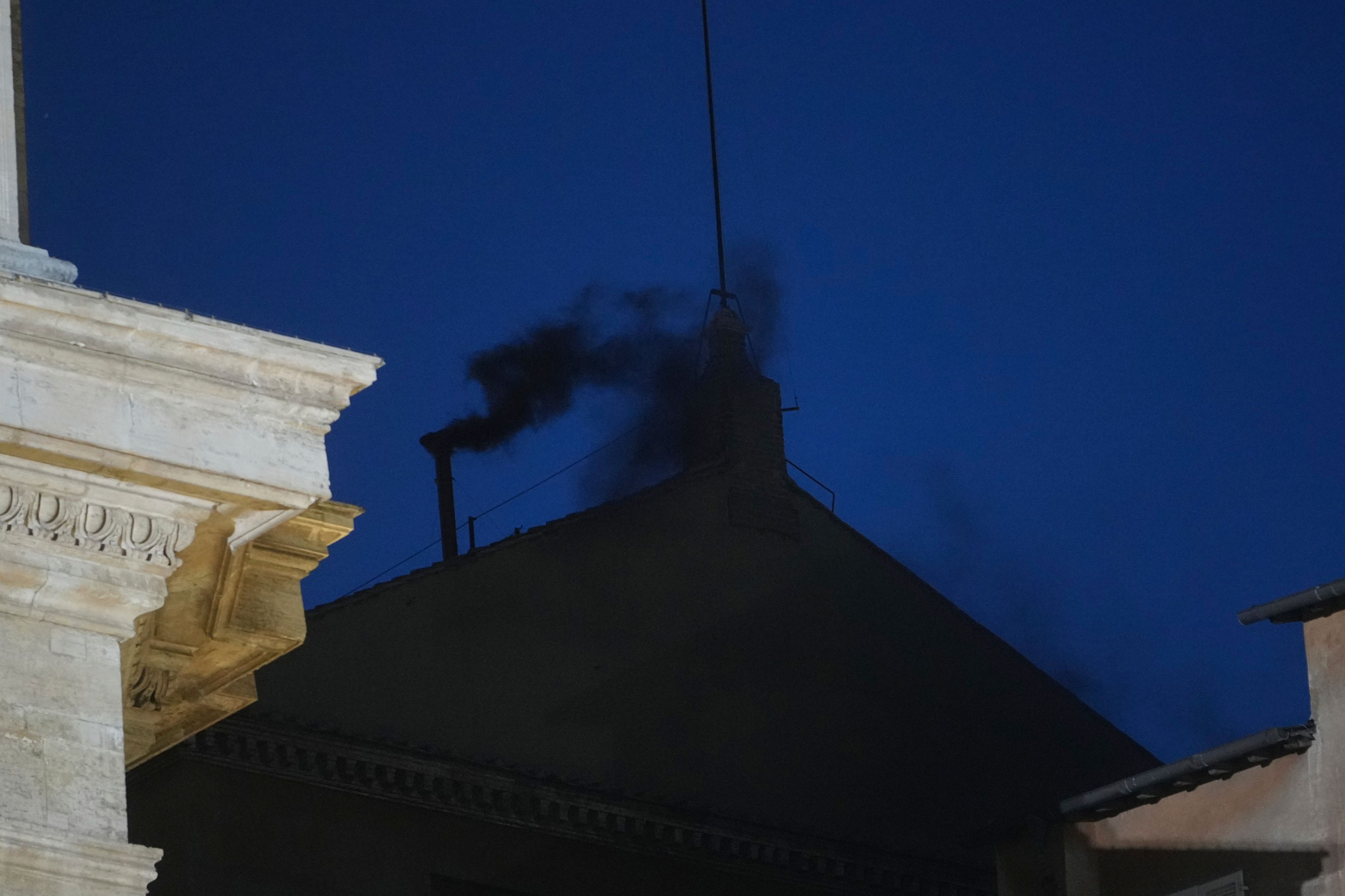 Black smoke pours from Sistine Chapel chimney, indicating no pope was elected as conclave opens