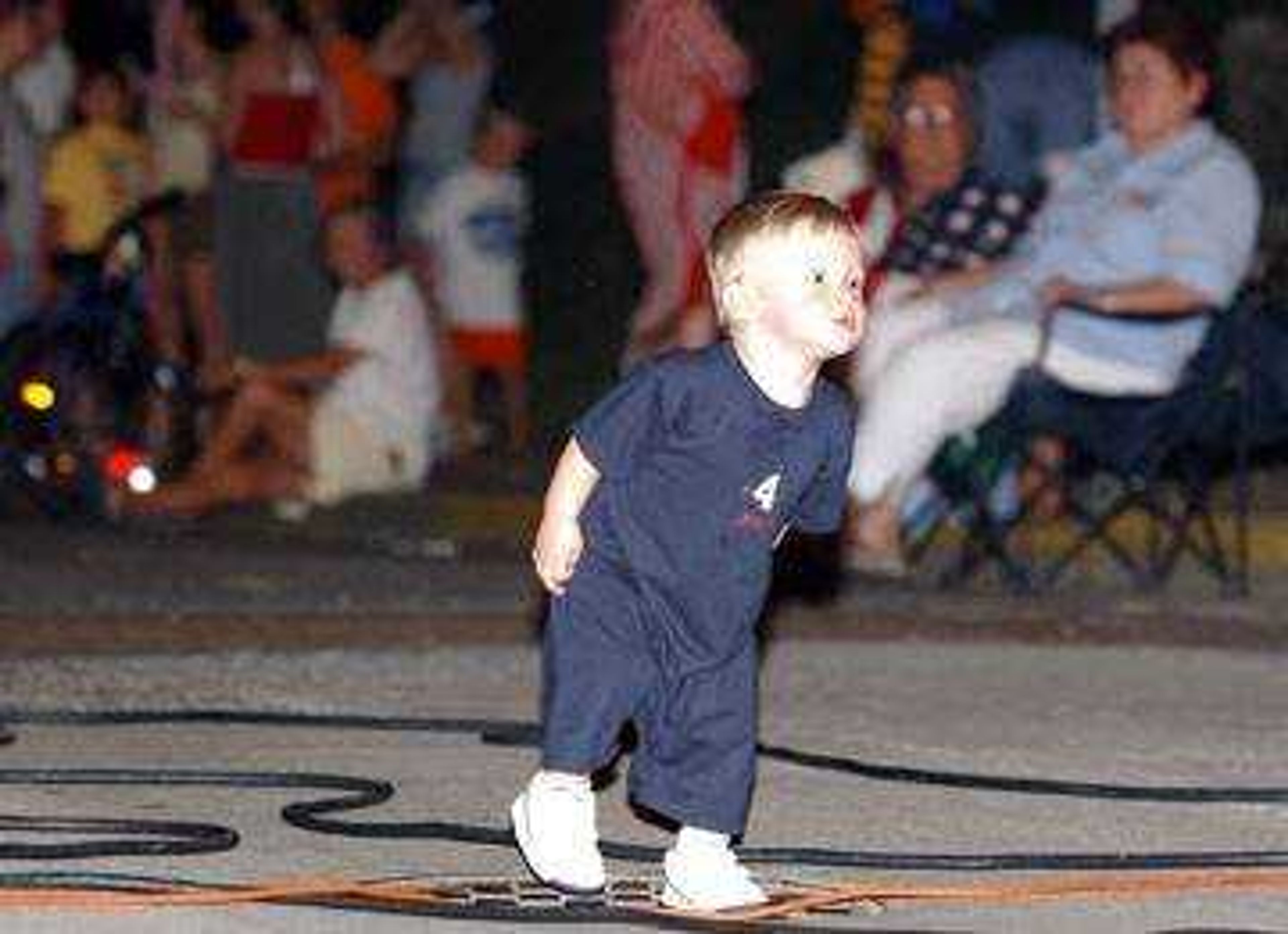 Mason Lewis, 17 mos., of Cape Girardeau danced the night away during Friday's, July 4, 2003, Indepenence Day celebration held in downtown Cape Girardeau.