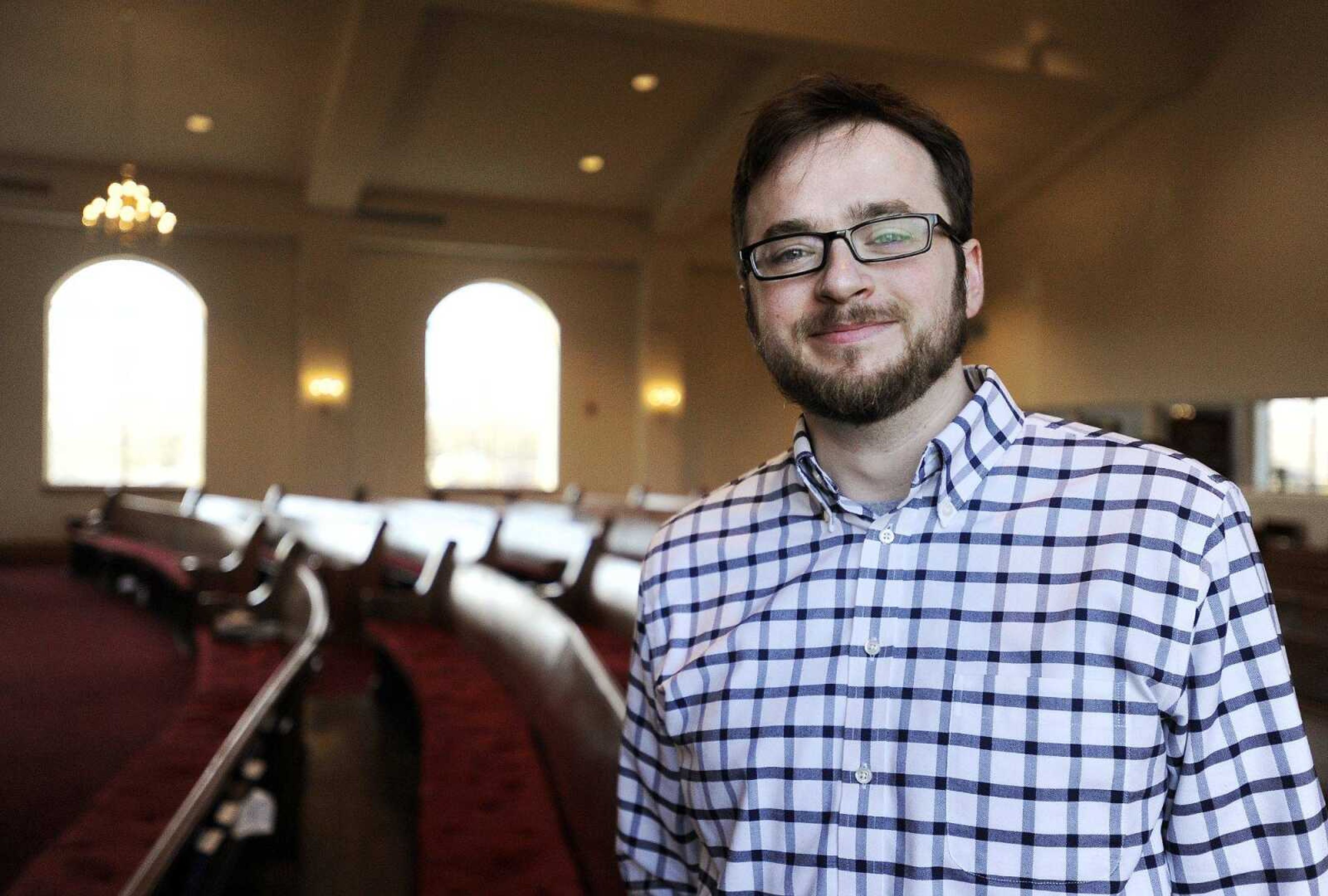 Tyler Tankersley, the new pastor at First Baptist Church in Cape Girardeau, poses for a photo Jan. 11 inside the church's sanctuary. (Laura Simon)