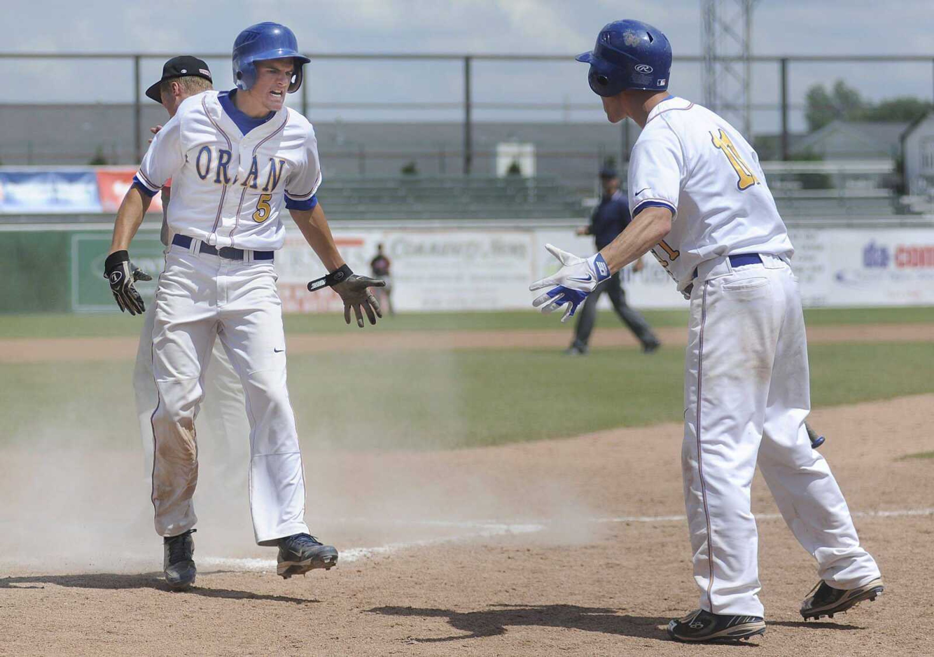 Oran's Chance Tenkhoff cheers after scoring the go-ahead run on a wild pitch by Santa Fe relief pitcher Chad Tiema in the fifth inning of the Eagles' 8-4 win over the Chiefs in the Class 1 championship game Wednesday, May 29, at T.R. Hughes Ballpark in O'Fallon, Mo. The Eagles ended Santa Fe pitcher Keaton Graf's no-hitter in the bottom of the fifth and scored all eight of their runs during the inning. (Adam Vogler)