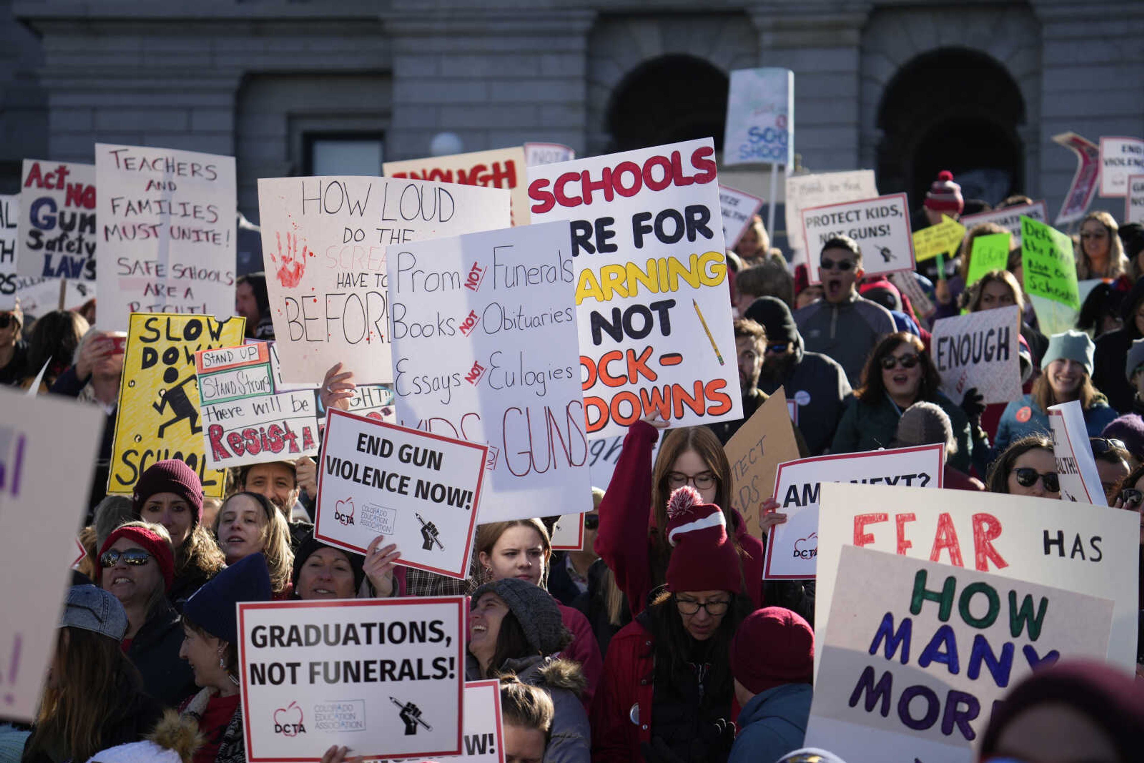 FILE - Students and parents from school across Colorado take part in a rally calling for state lawmakers to consider gun control measures during the current legislative session, March 24, 2023, outside the State Capitol in Denver. Colorado's Democratic-controlled Legislature has nixed a sweeping bill Tuesday, May 7, 2024, to ban the sale and transfer of semi-automatic firearms. (AP Photo/David Zalubowski, File)