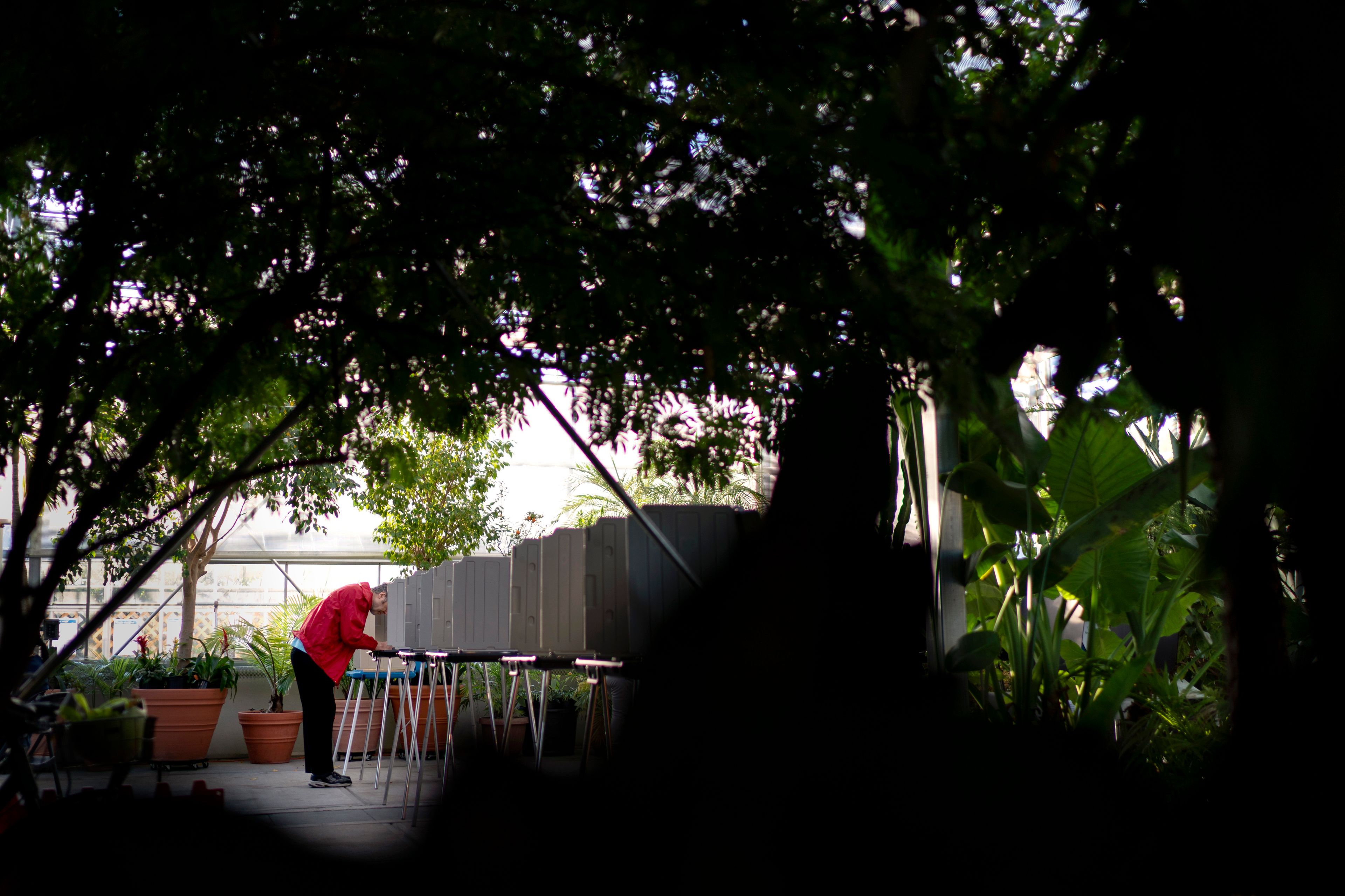 FILE - A voter marks a ballot for the midterm election at a polling site at the Roger Williams Park Botanical Center in Providence, R.I., Tuesday, Nov. 8, 2022. (AP Photo/David Goldman, File)