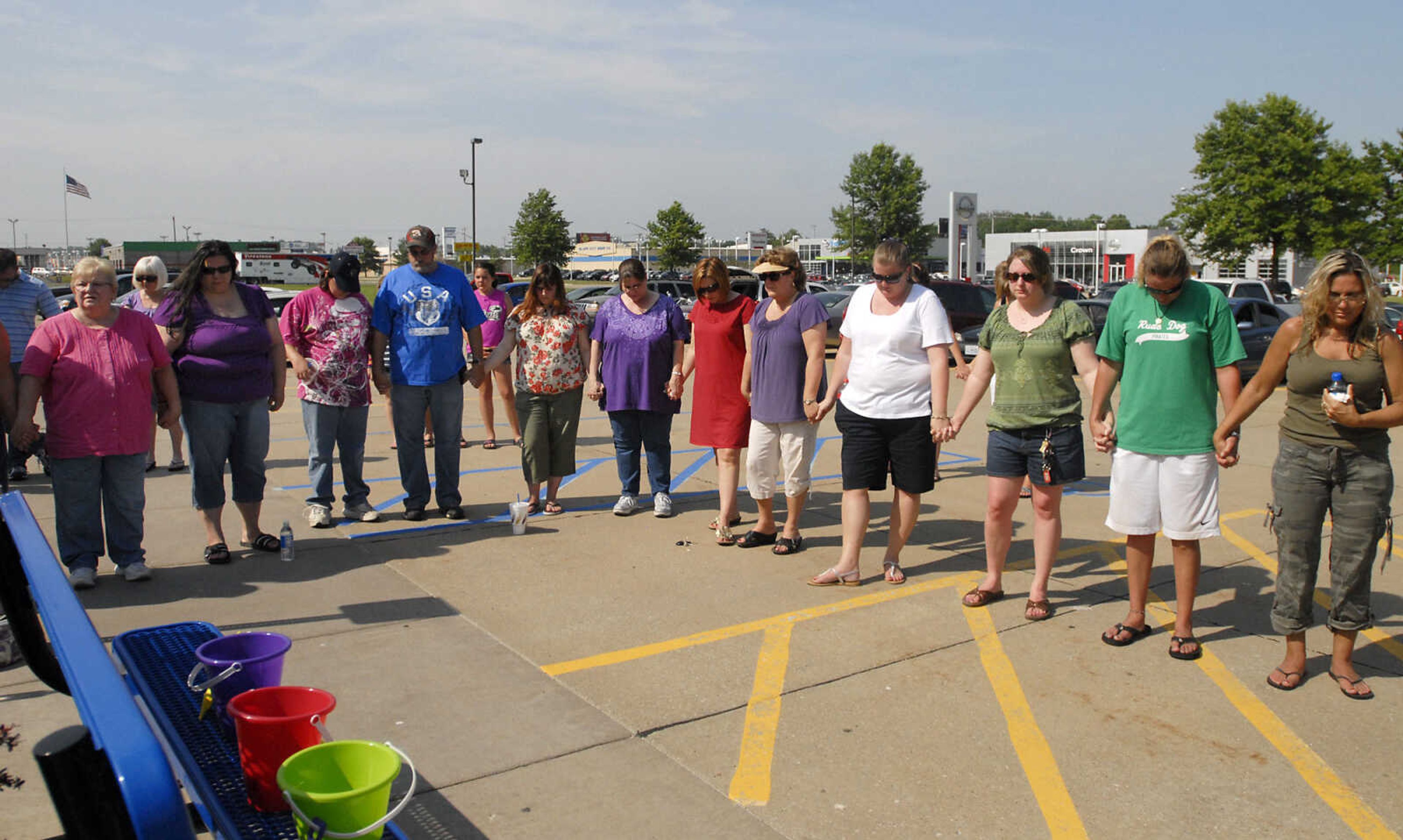 KRISTIN EBERTS ~ keberts@semissourian.com

Friends and family members attend a prayer service for Jacque Sue Waller at Anthem Blue Cross Blue Shield in Cape Girardeau on Saturday, June 4, 2011. Waller, a 39-year-old mother of three has been missing since Wednesday.