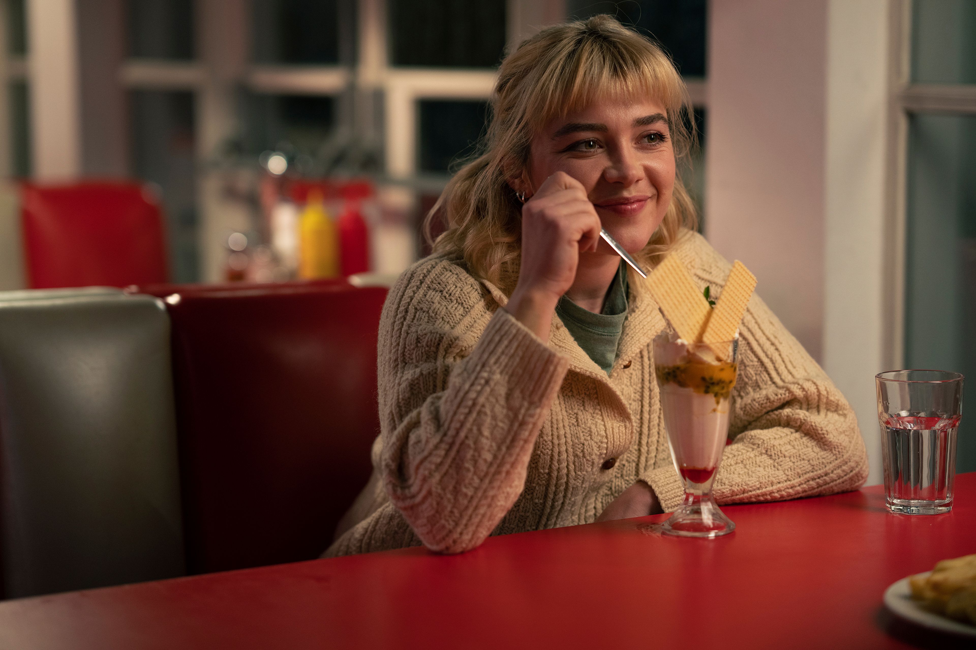 This image released by A24 shows Florence Pugh in a scene from "We Live In Time." (Peter Mountain/A24 via AP)