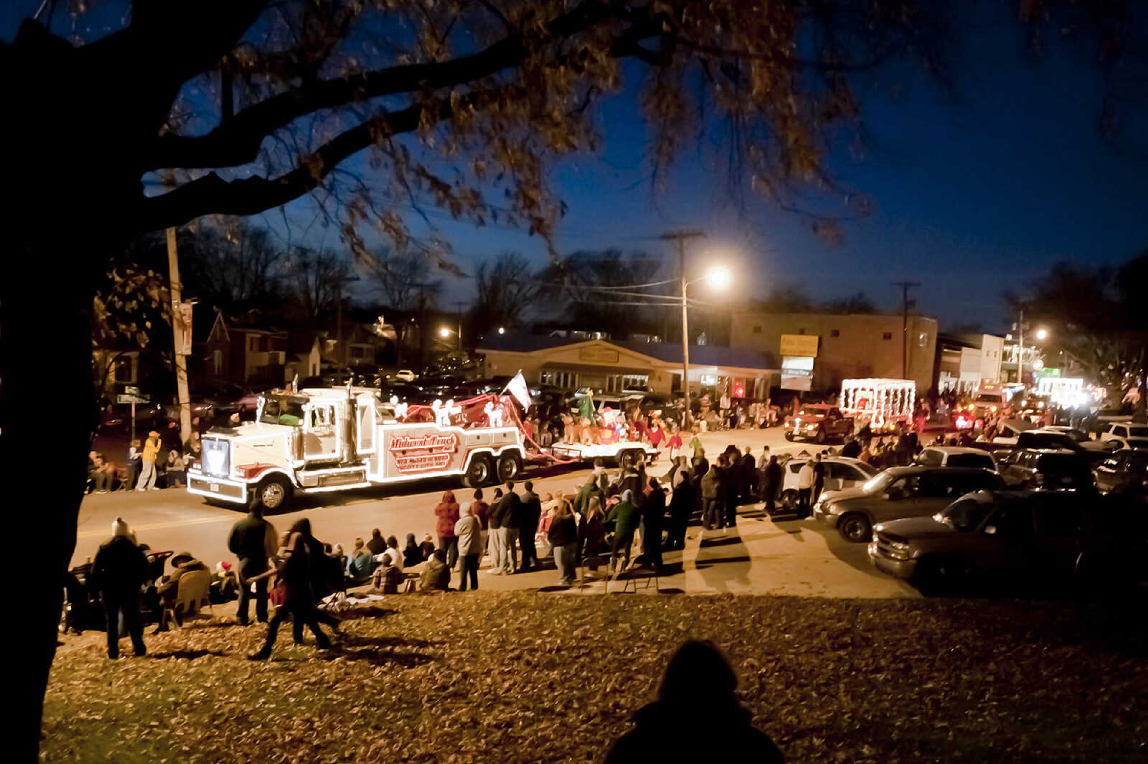 Floats travel down Broadway during the 22nd Annual Parade of Lights Sunday, Dec. 1, in Cape Girardeau. The parade started at Capaha Park making its way down Broadway and Main Street. The theme for this year's parade was ŇChristmas Fun for Everyone.Ó