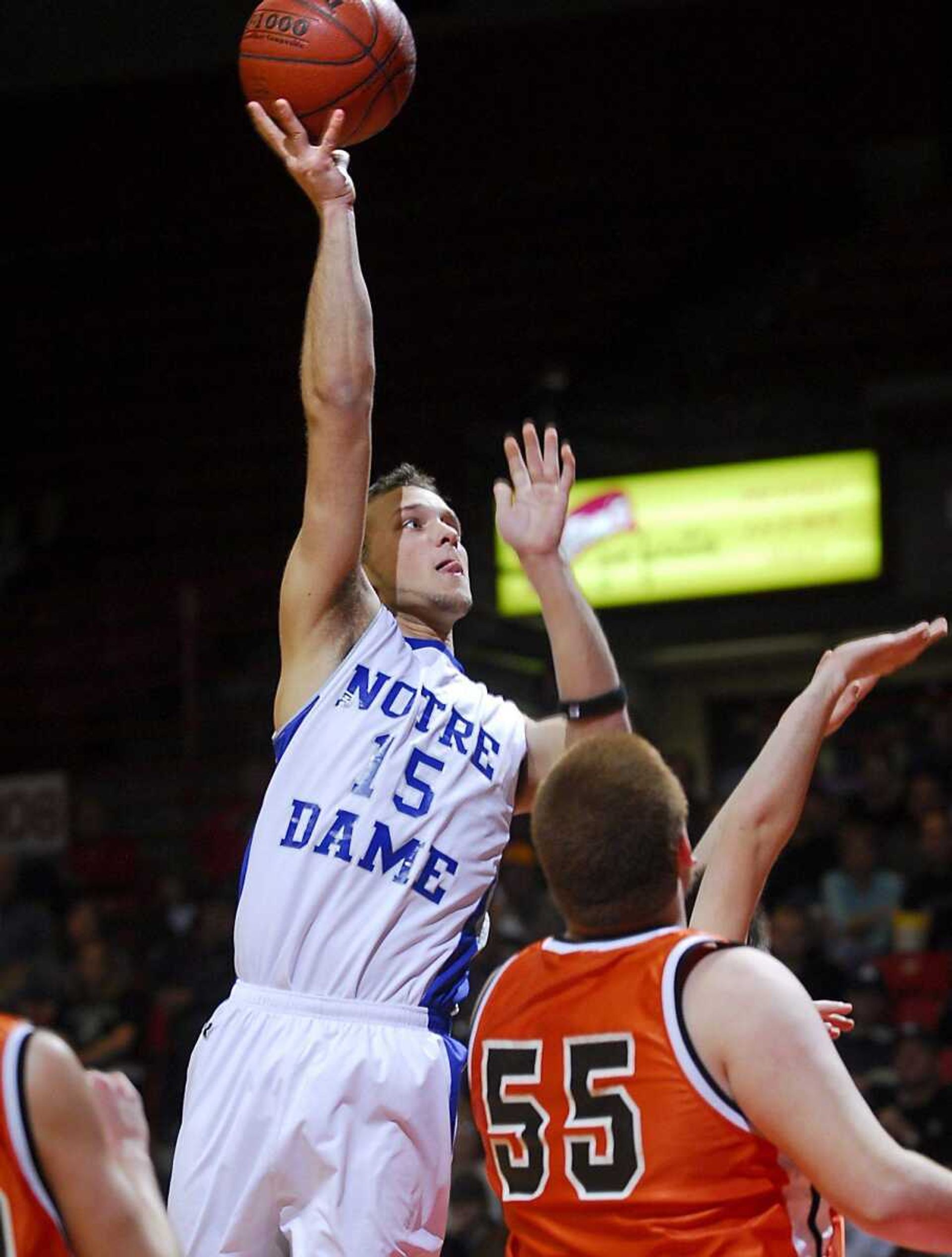 Notre Dame's Blake Gaddis put up a shot against Advance in the second quarter Wednesday at the Southeast Missourian Christmas Tournament. (Fred Lynch)