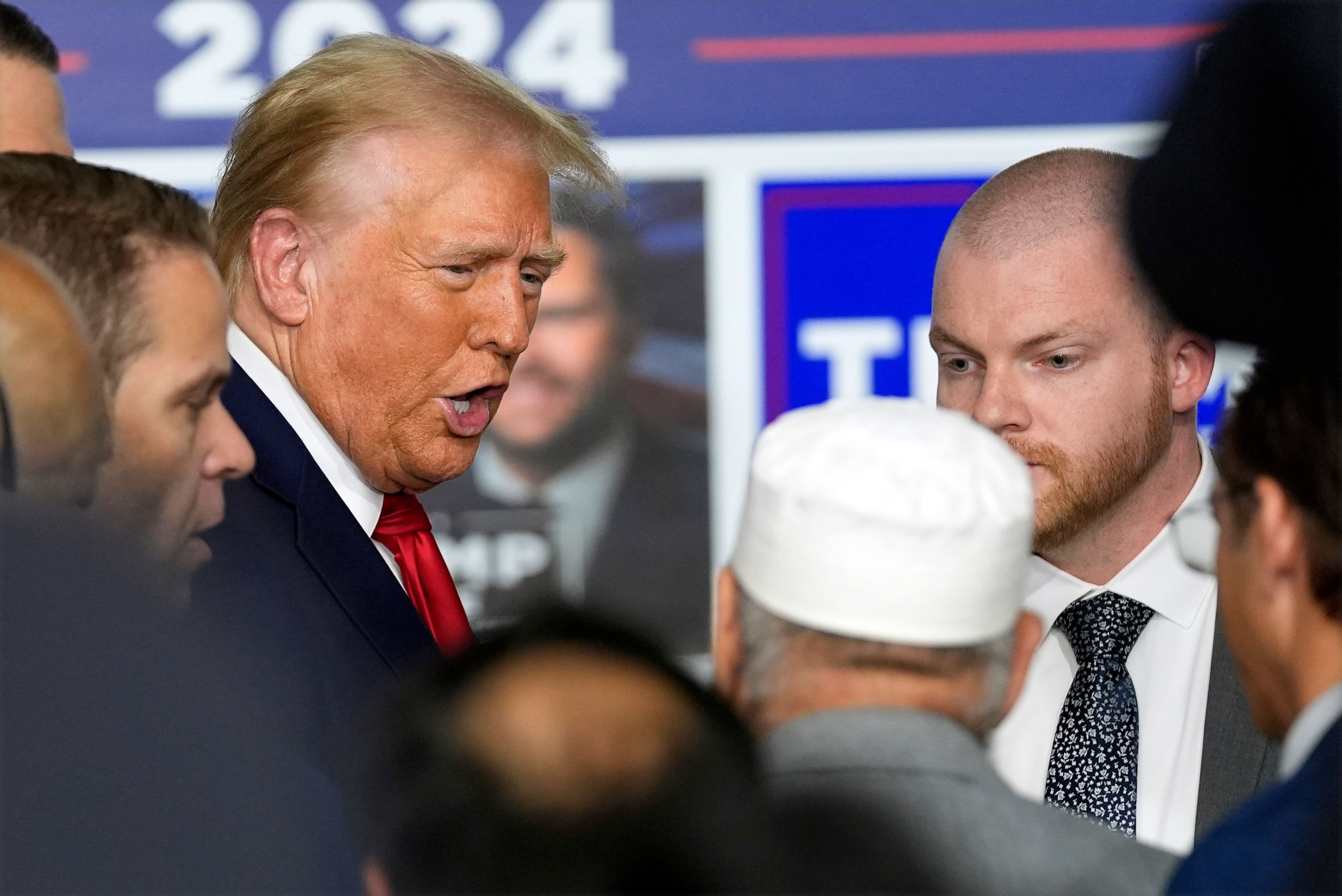 Republican presidential nominee former President Donald Trump visits a campaign office, Friday, Oct. 18, 2024, in Hamtramck, Mich. (AP Photo/Evan Vucci)