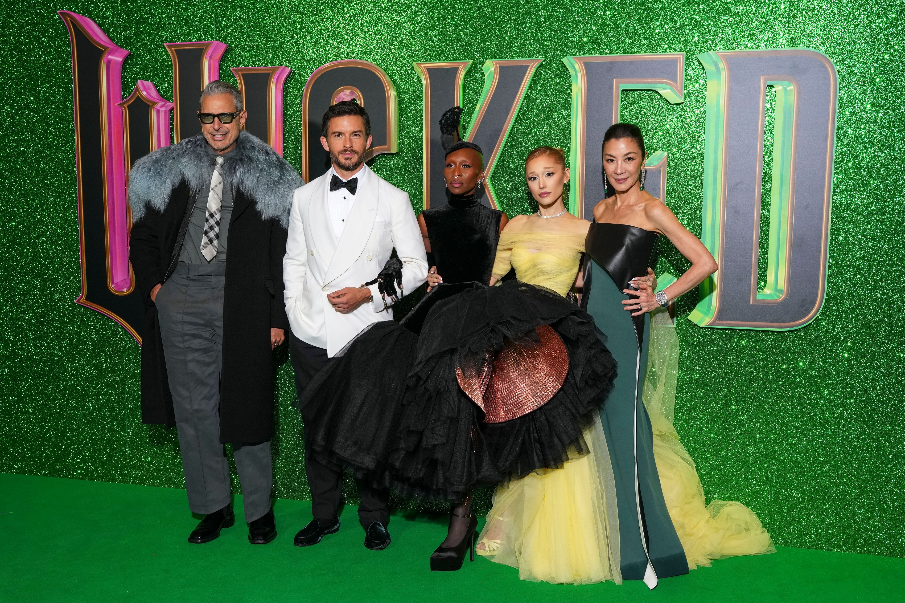 Jeff Goldblum, from left, Jonathan Bailey, Cynthia Erivo, Ariana Grande and Michelle Yeoh pose for photographers upon arrival at the premiere of the film 'Wicked' on Monday, Nov. 18, 2024, in London. (Photo by Scott A Garfitt/Invision/AP)