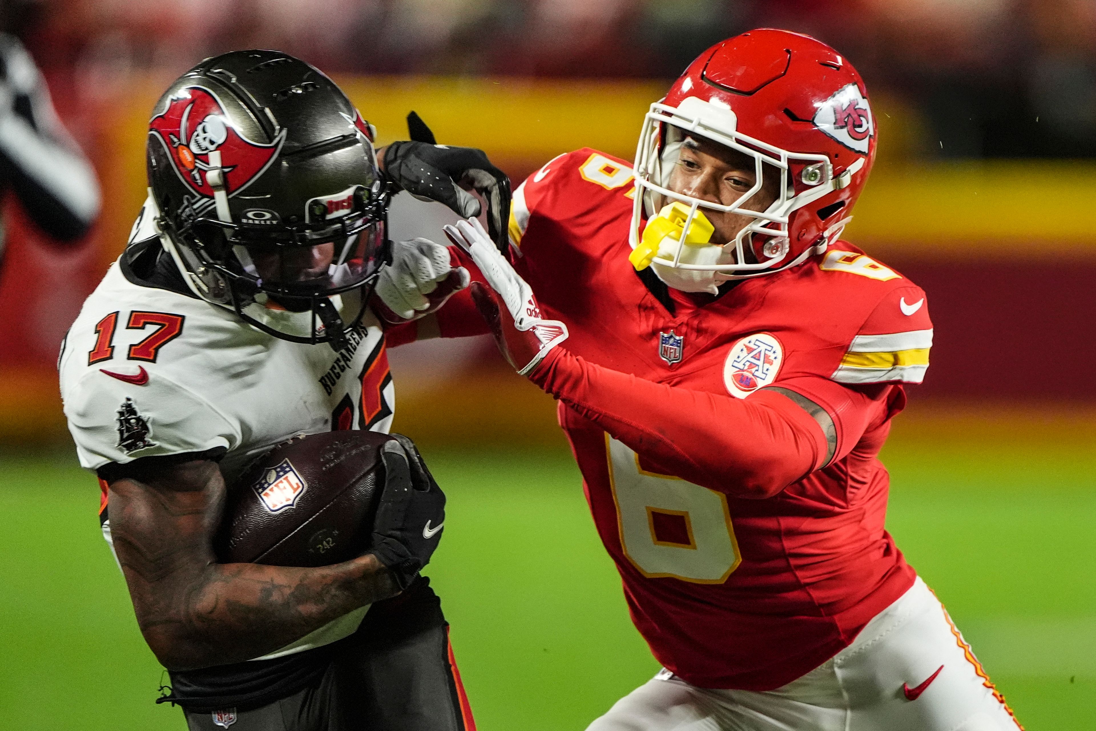 Tampa Bay Buccaneers wide receiver Sterling Shepard (17) runs against Kansas City Chiefs safety Bryan Cook (6) during the first half of an NFL football game, Monday, Nov. 4, 2024, in Kansas City, Mo. (AP Photo/Charlie Riedel)