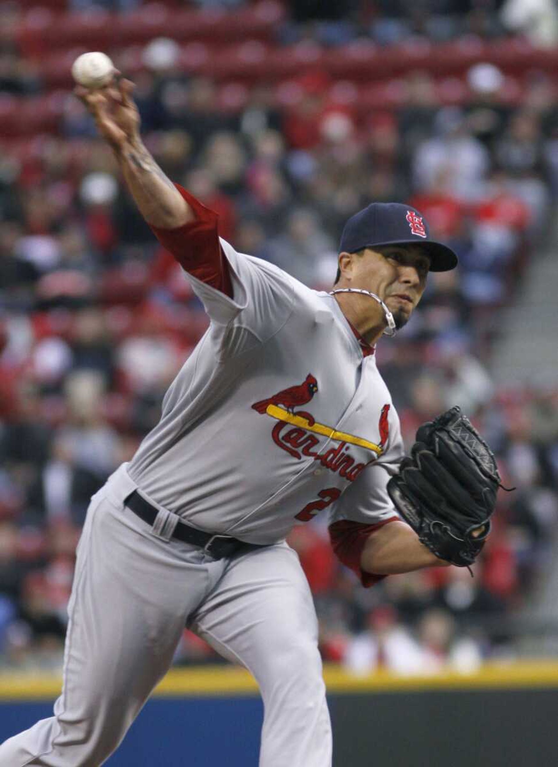 Cardinals starting pitcherKyle Lohse delivers a pitch to a Reds batter during the first inning Tuesday in Cincinnati. Lohse allowed four hits over six innings to improve to 2-0.Tom UhlmanAssociated Press