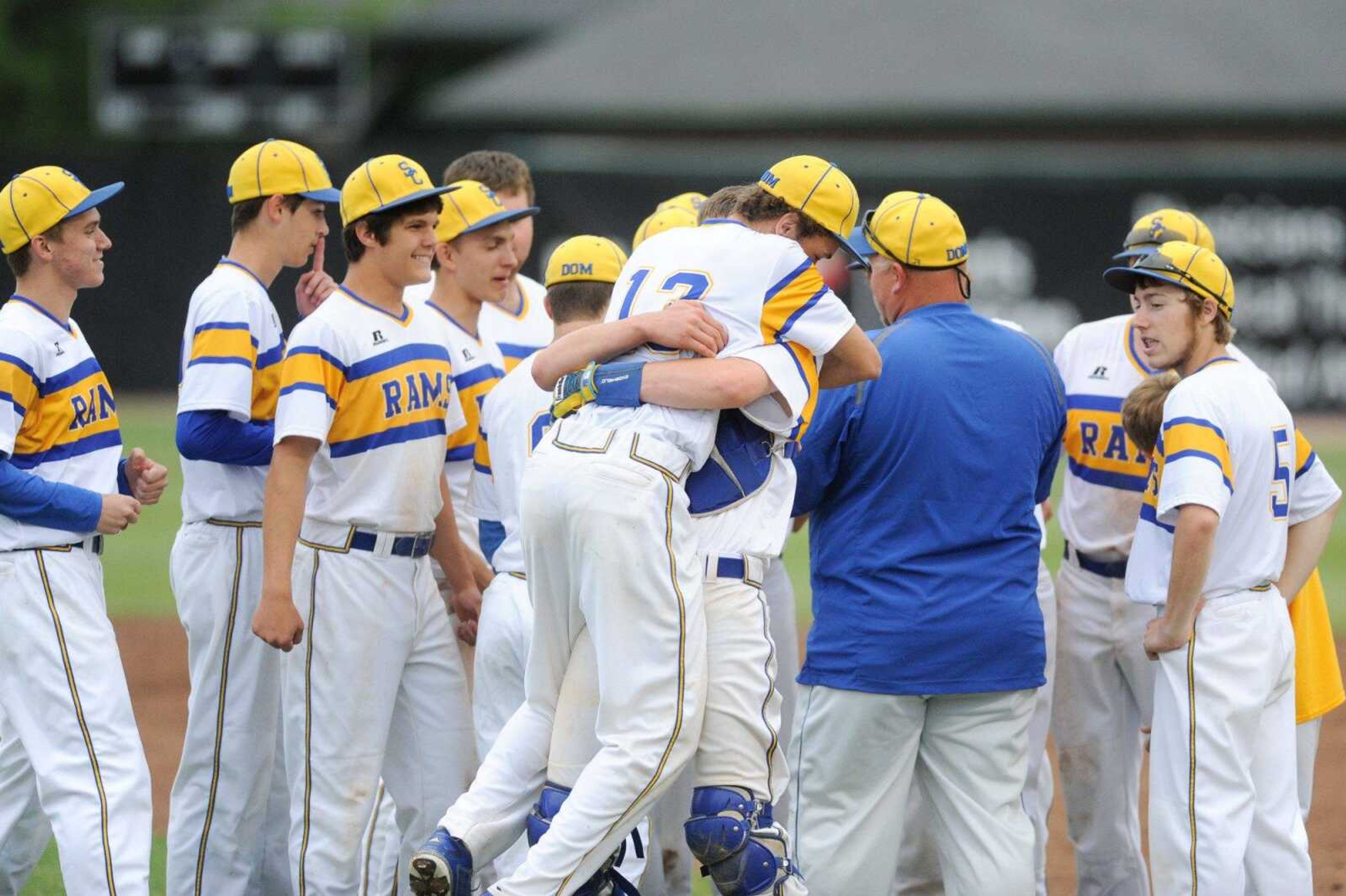 Scott City players celebrate after their 4-1 win over Warsaw in a Class 3 semifinal Monday, June 1, 2015 in O Fallon, Missouri. (Glenn Landberg)