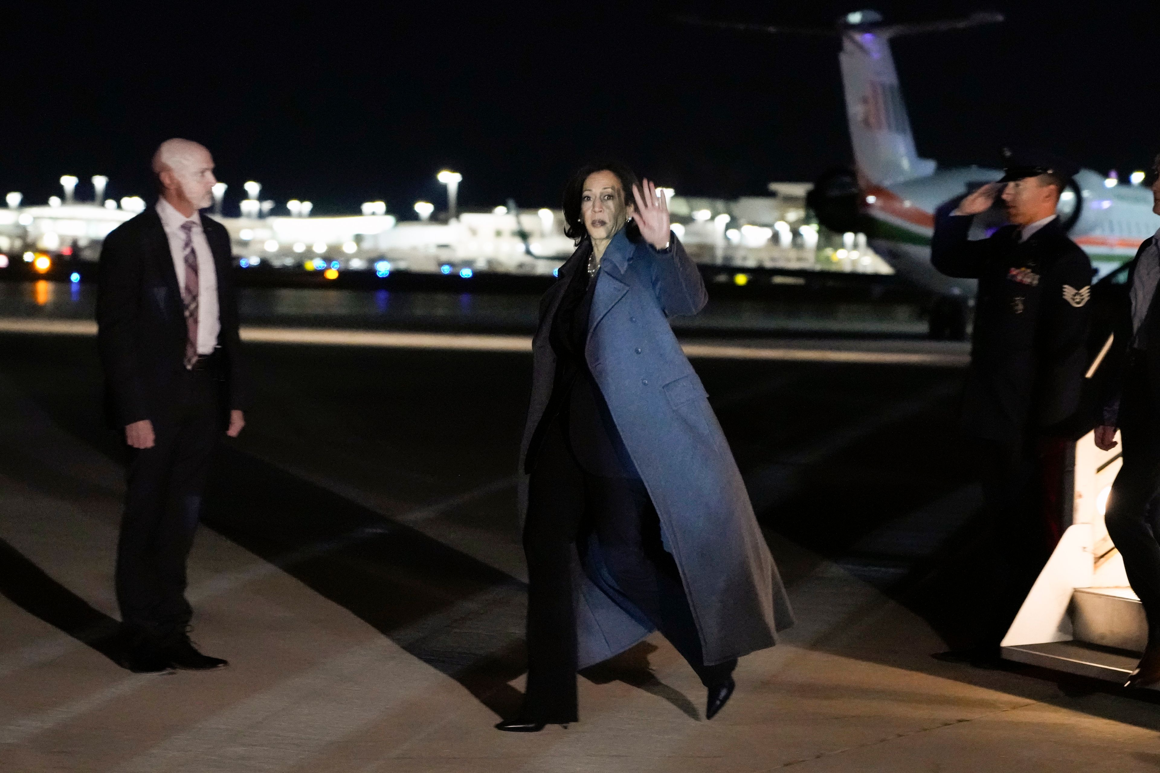 Democratic presidential nominee Vice President Kamala Harris arrives at LaGuardia Airport, Saturday night, Nov. 2, 2024, in East Elmhurst, N.Y. Harris has made an unannounced trip to New York to appear on an episode of “Saturday Night Live,” briefly stepping away from the battleground states she’s been campaigning in with just three days to go before the election. (AP Photo/Jacquelyn Martin)