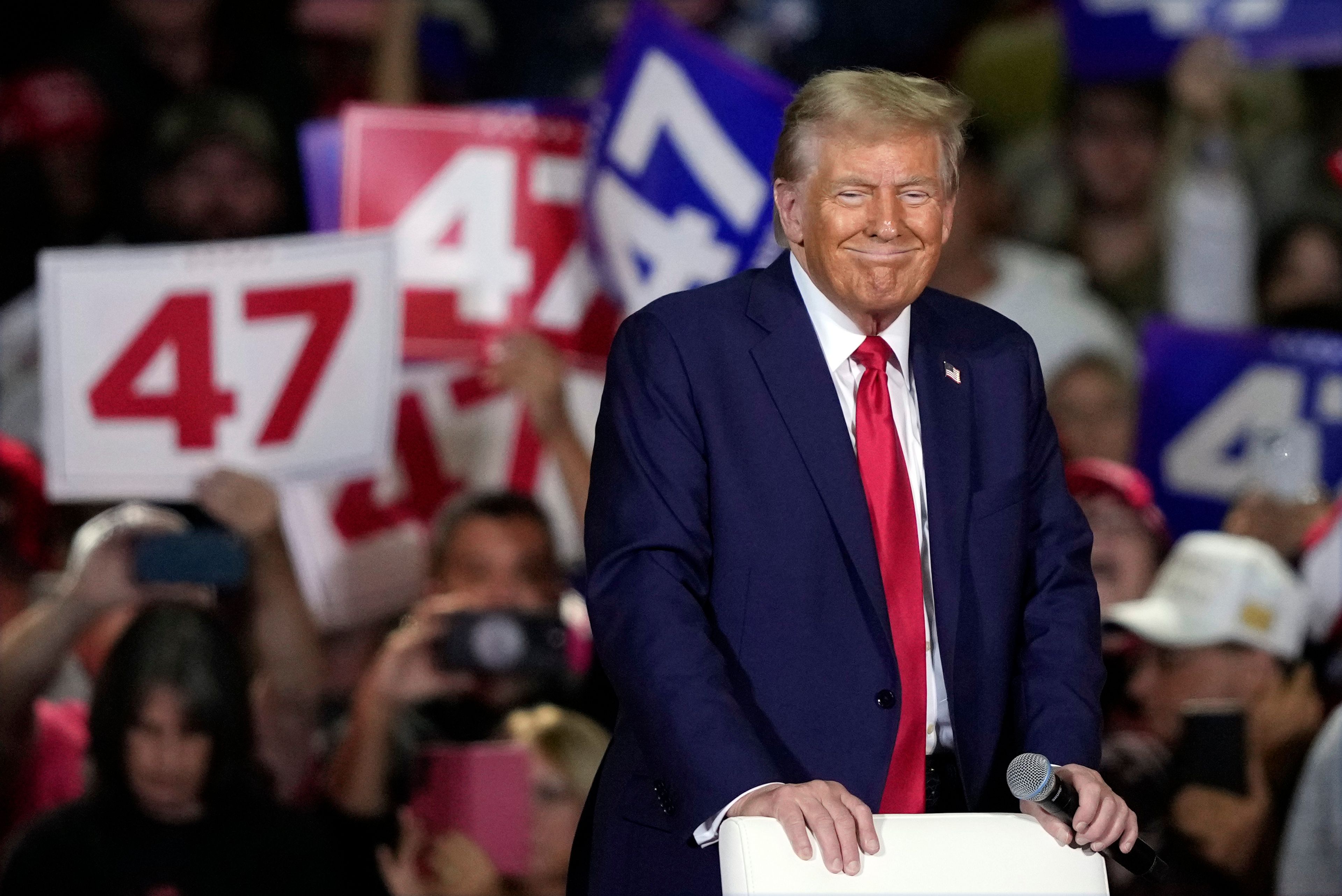 Republican presidential nominee former President Donald Trump smiles at a town hall in Lancaster, Pa., Sunday, Oct. 20, 2024. (AP Photo/Susan Walsh)