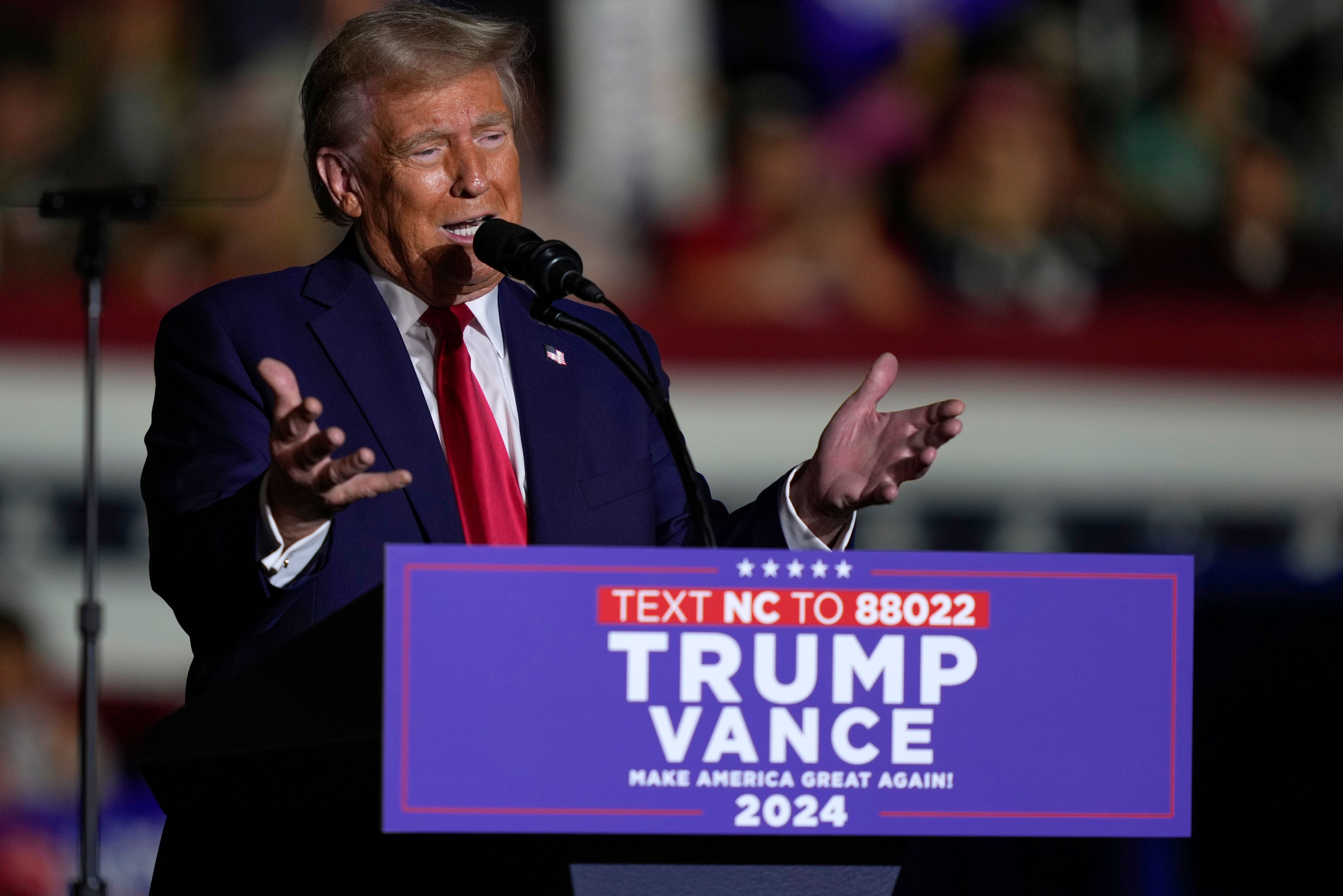 Republican presidential nominee former President Donald Trump speaks at a campaign rally at Williams Arena at Mignes Coliseum, Monday, Oct. 21, 2024, in Greenville, N.C. (AP Photo/EJulia Demaree Nikhinson)