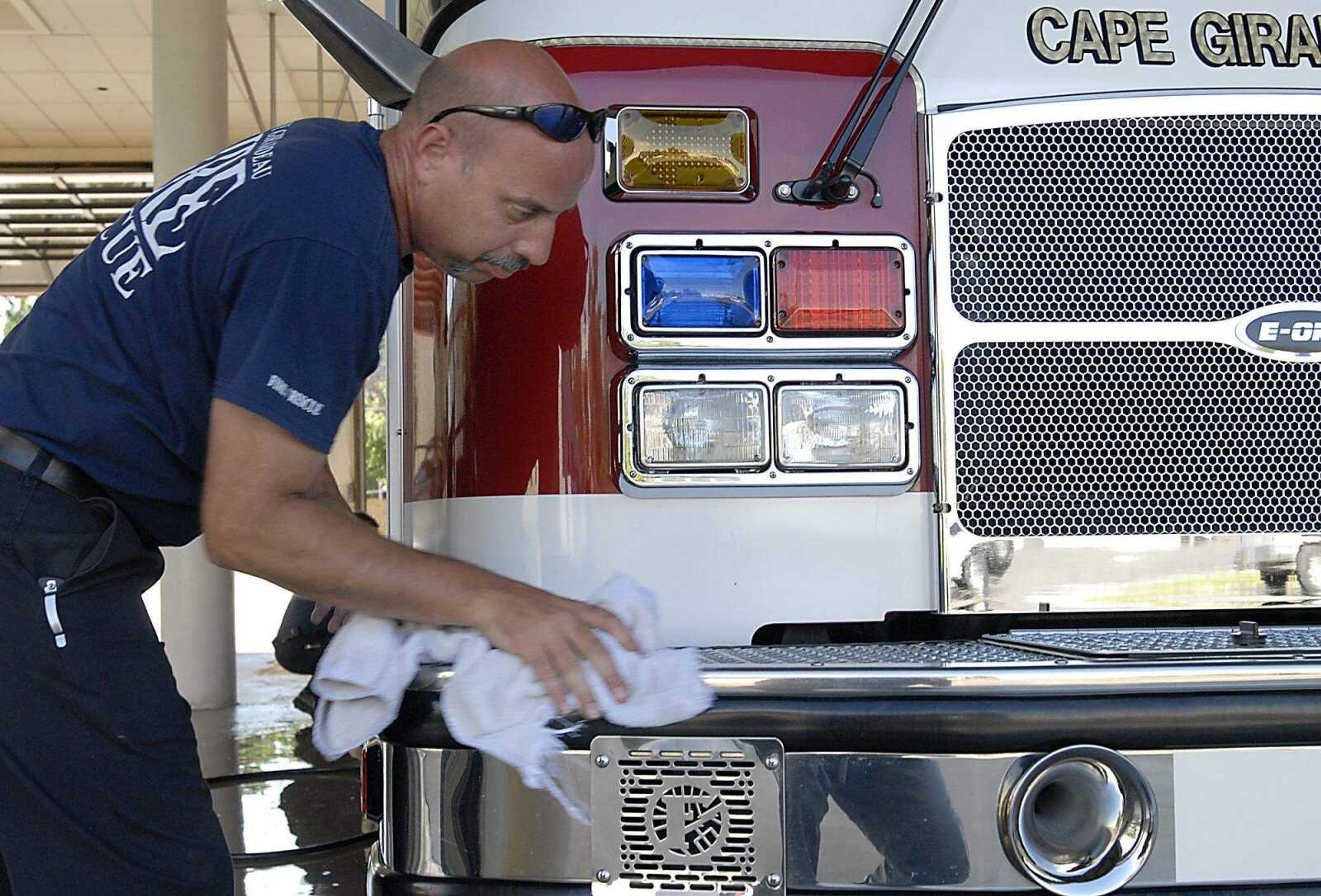 KIT DOYLE ~ kdoyle@semissourian.com
Gale Phillips wiped down an engine Tuesday afternoon, June 17, 2008, at Station 1 in Cape Girardeau.