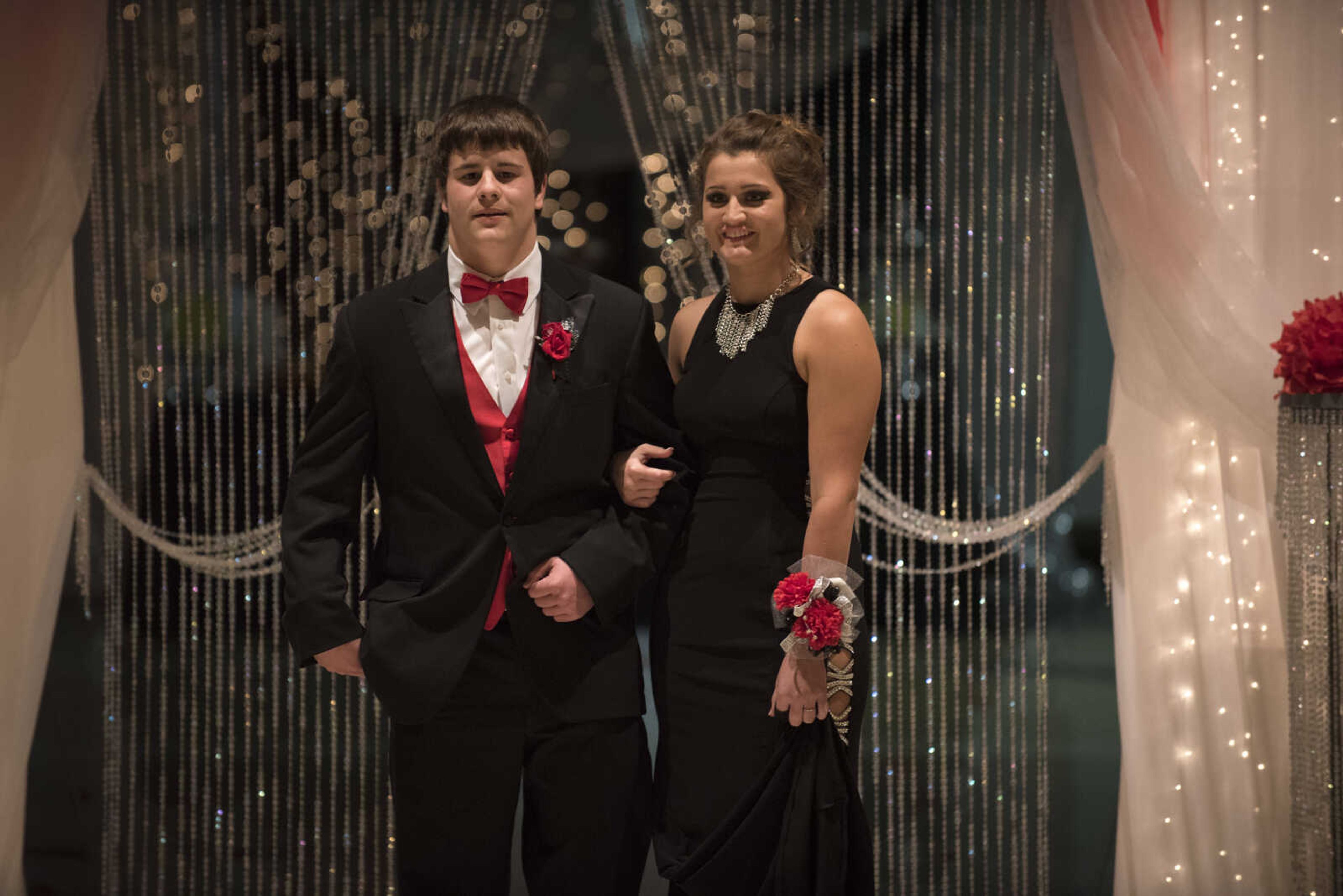 Students walk for the grand march during the Chaffee prom Saturday, April 1, 2017 at the University Center on the campus of Southeast Missouri State University in Cape Girardeau.