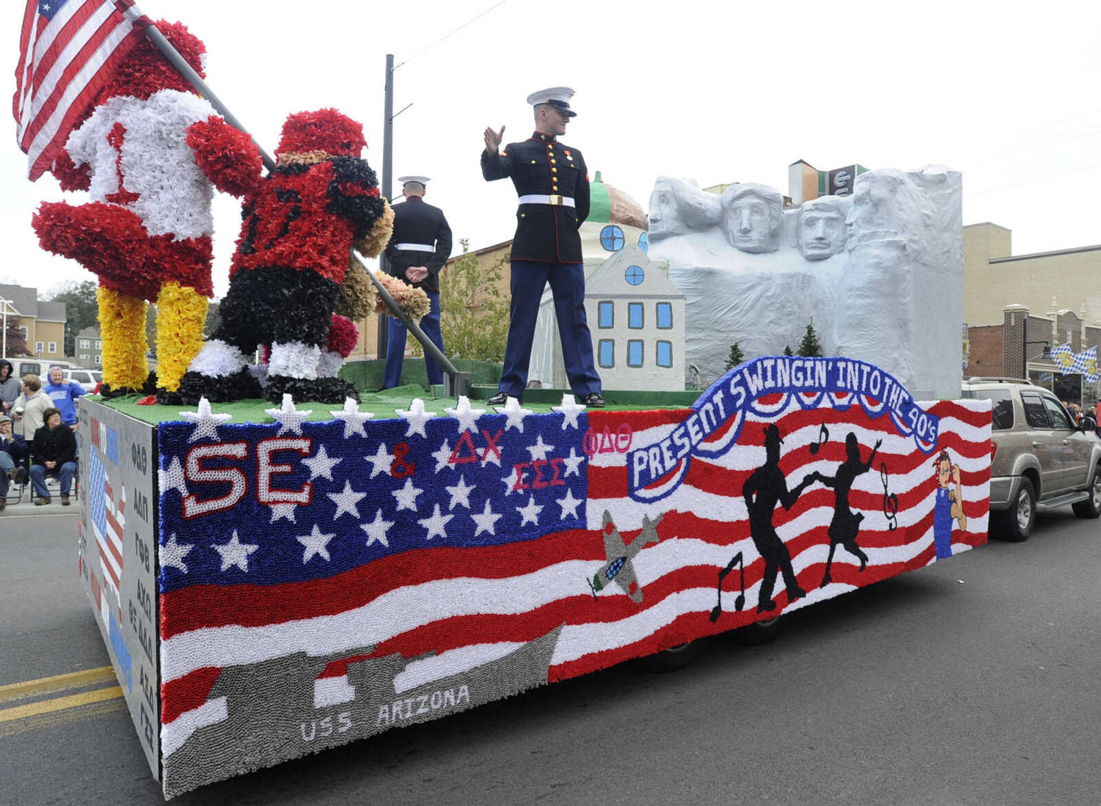 FRED LYNCH ~ flynch@semissourian.com
"Swingin' into the '40s" is one of the floats in the SEMO Homecoming parade Saturday, Oct. 26, 2013 on Broadway in Cape Girardeau.